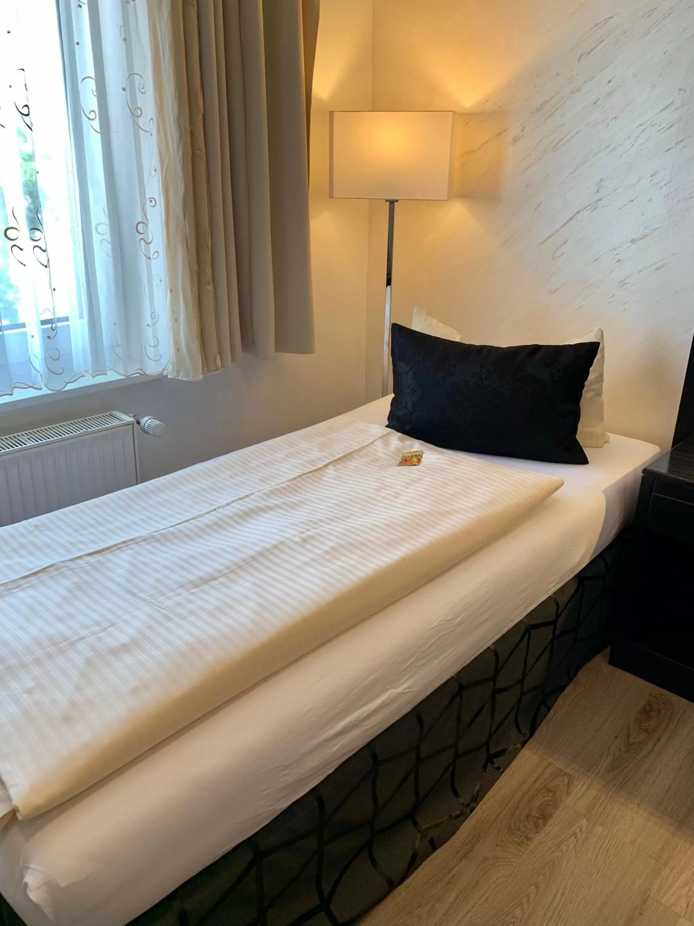 Bed in Boutique Hotel Goldene Henne