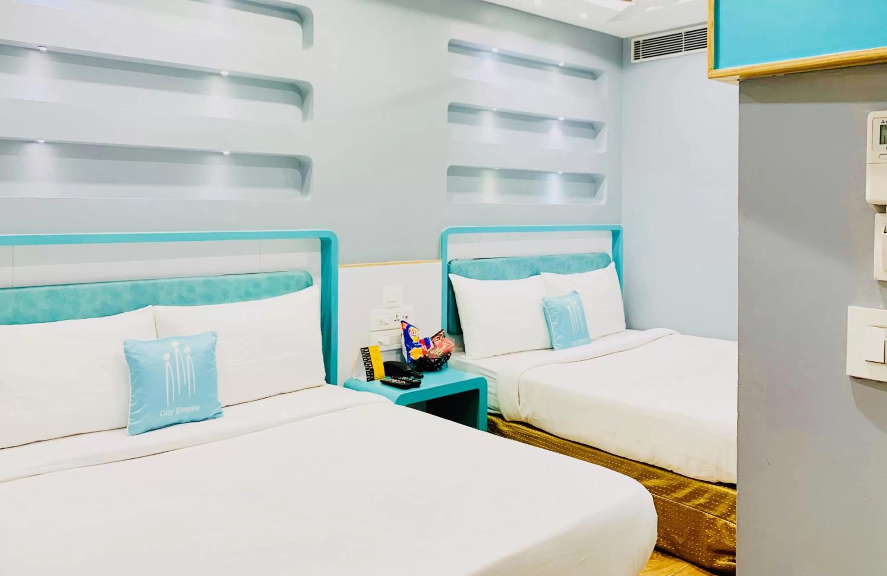 Photo of the whole room, Bed in City Empire - New Delhi Railway Station, Near Connaught Place