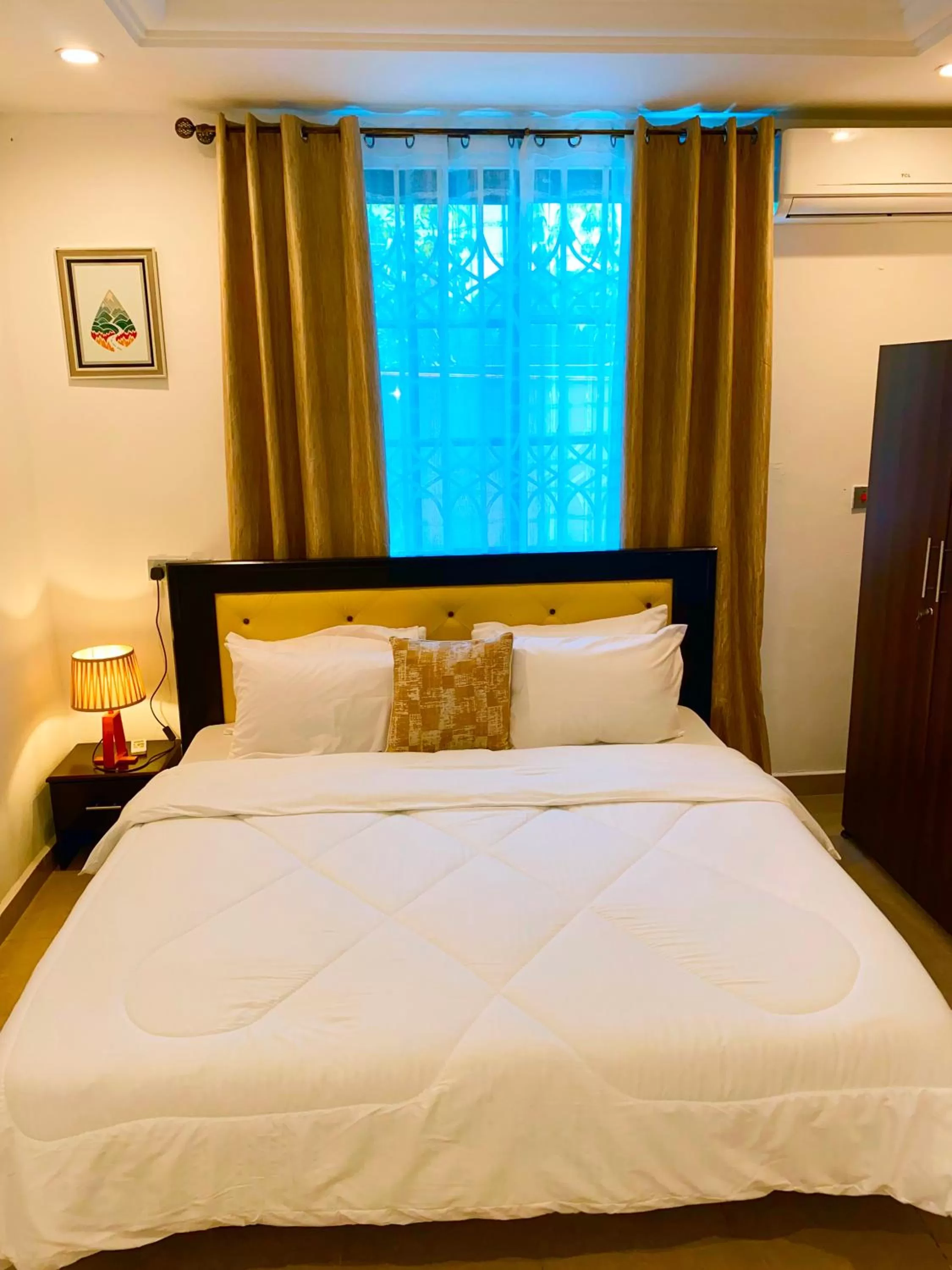 Bed in AIDEN HOMES AND APARTMENTS