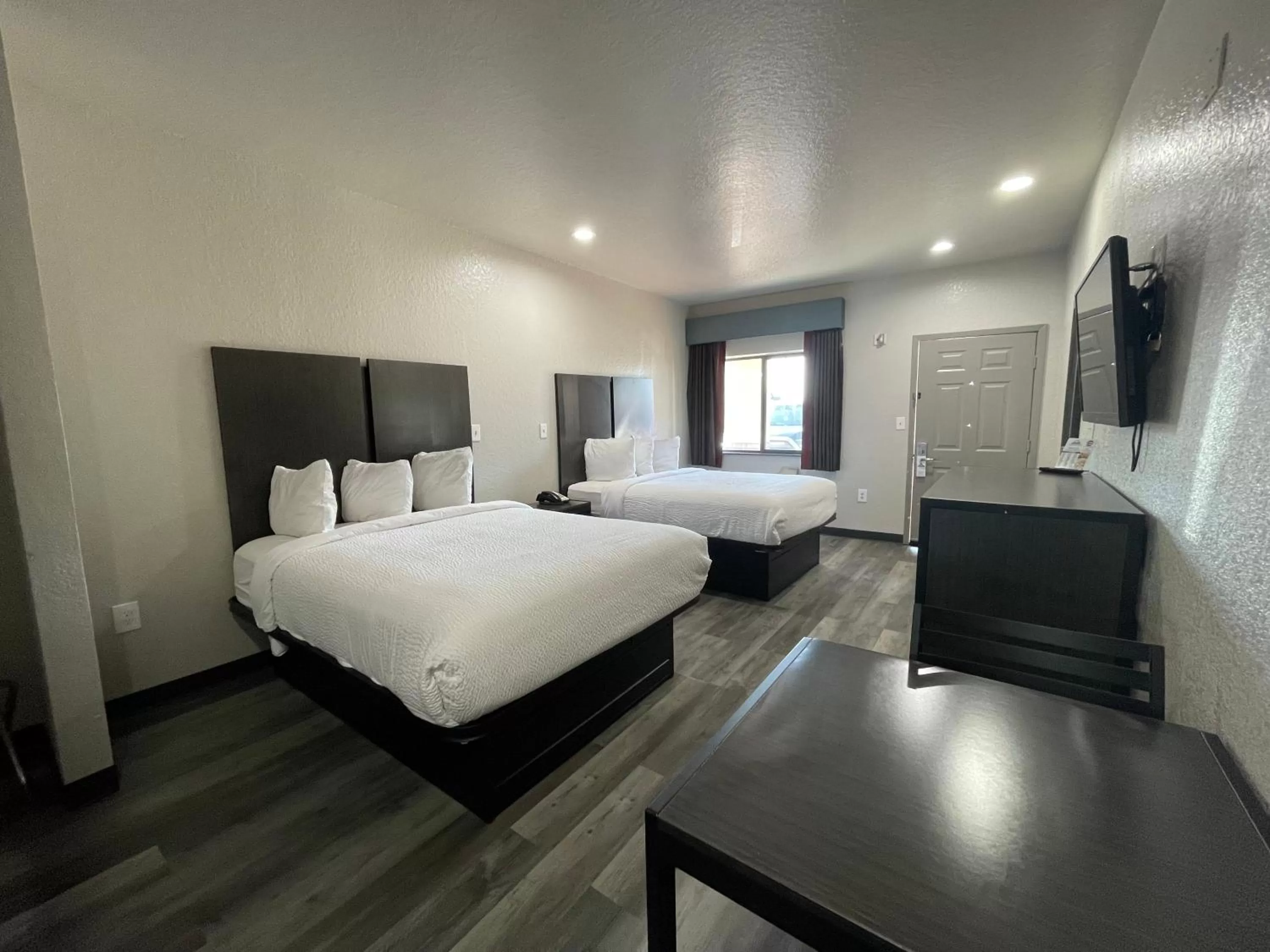 Bedroom, Bed in Days Inn by Wyndham Dickinson TX