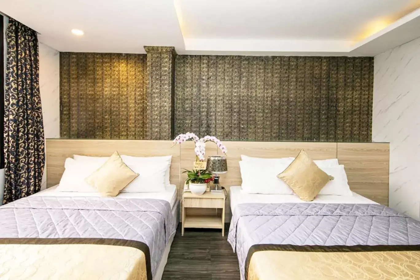 Deluxe Twin Room in Nouveau Happy Inn - Bến Thành Deluxe Twin Room in Nouveau Happy Inn - Bến Thành