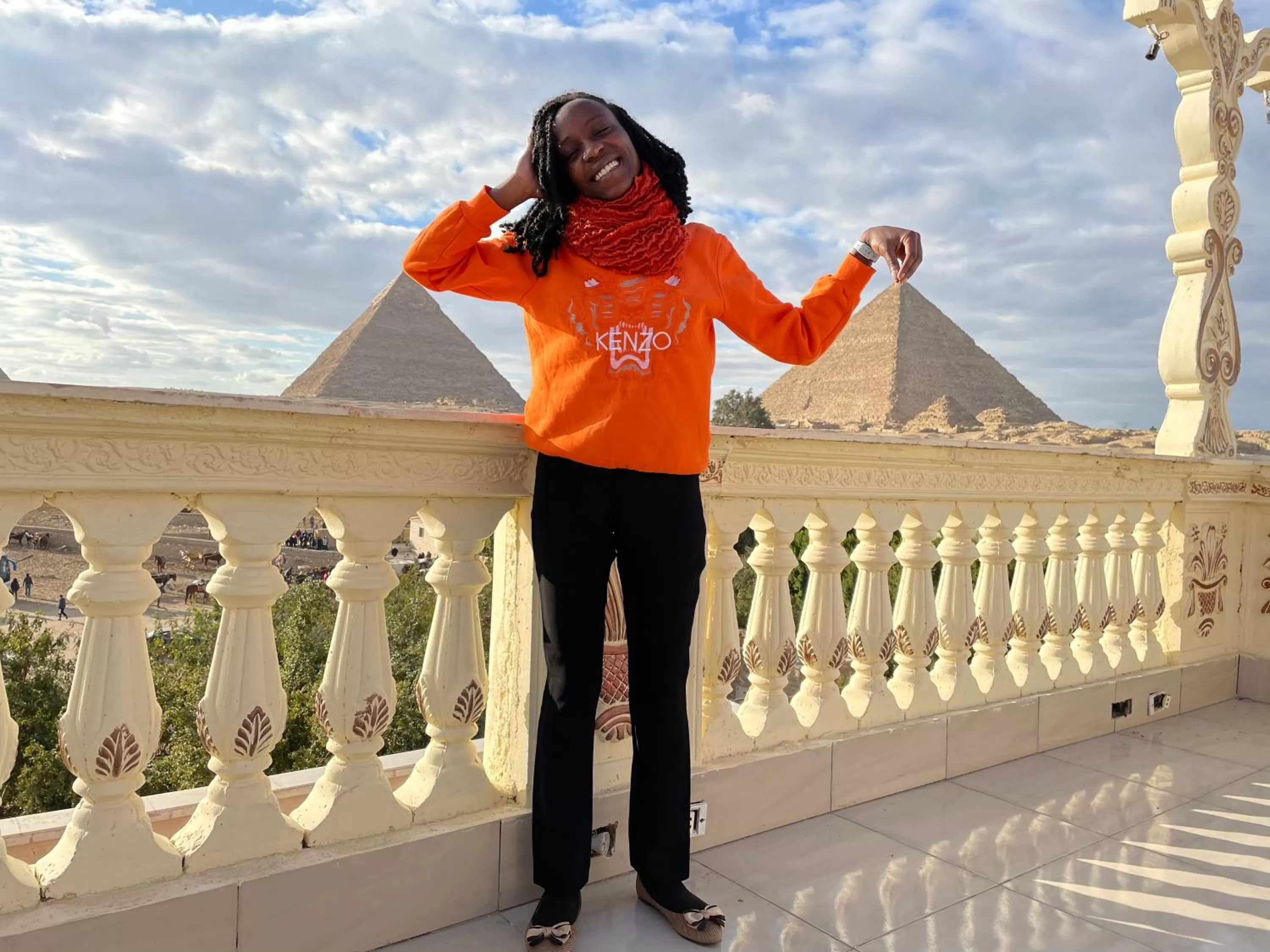 Sphinx palace pyramids view