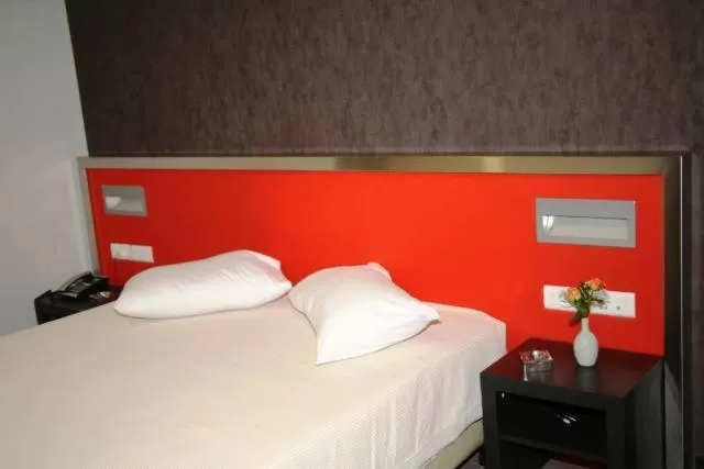 Bed in Hotel Des Roses