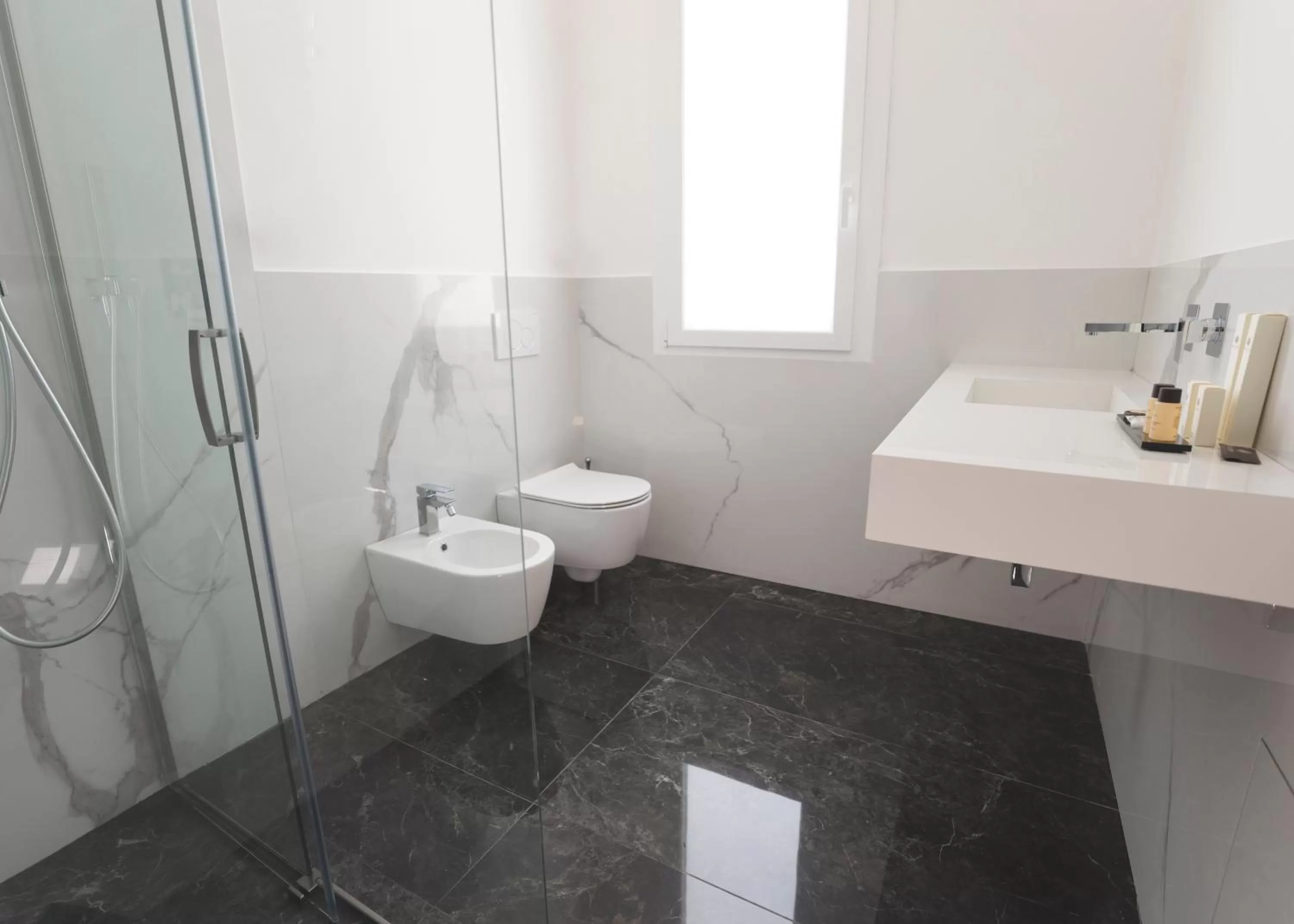 Shower in Thalya Luxury Rooms