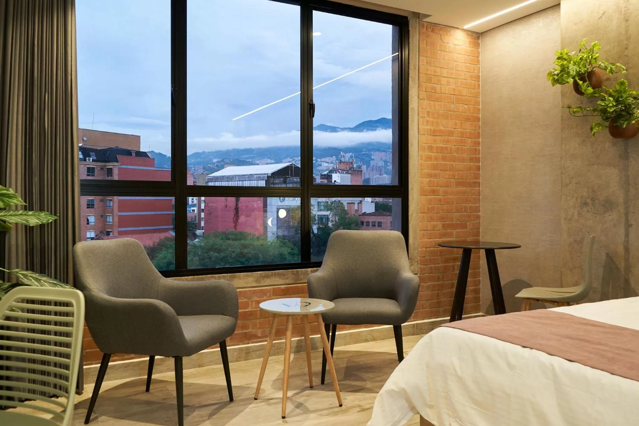 Living room, Bed in Eutopiq Hotel