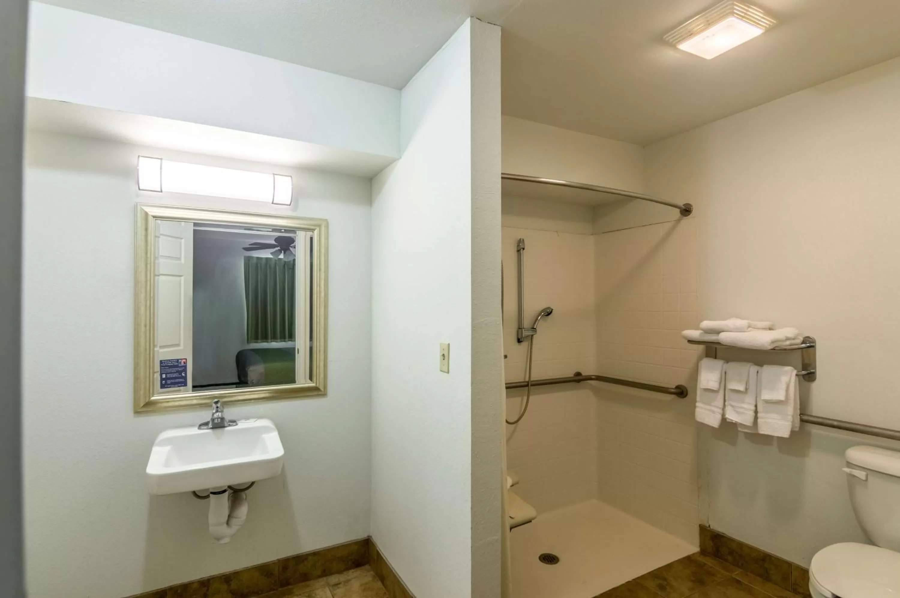 Shower in Blue Bonnet Suites -Lubbock, TX - Medical Center