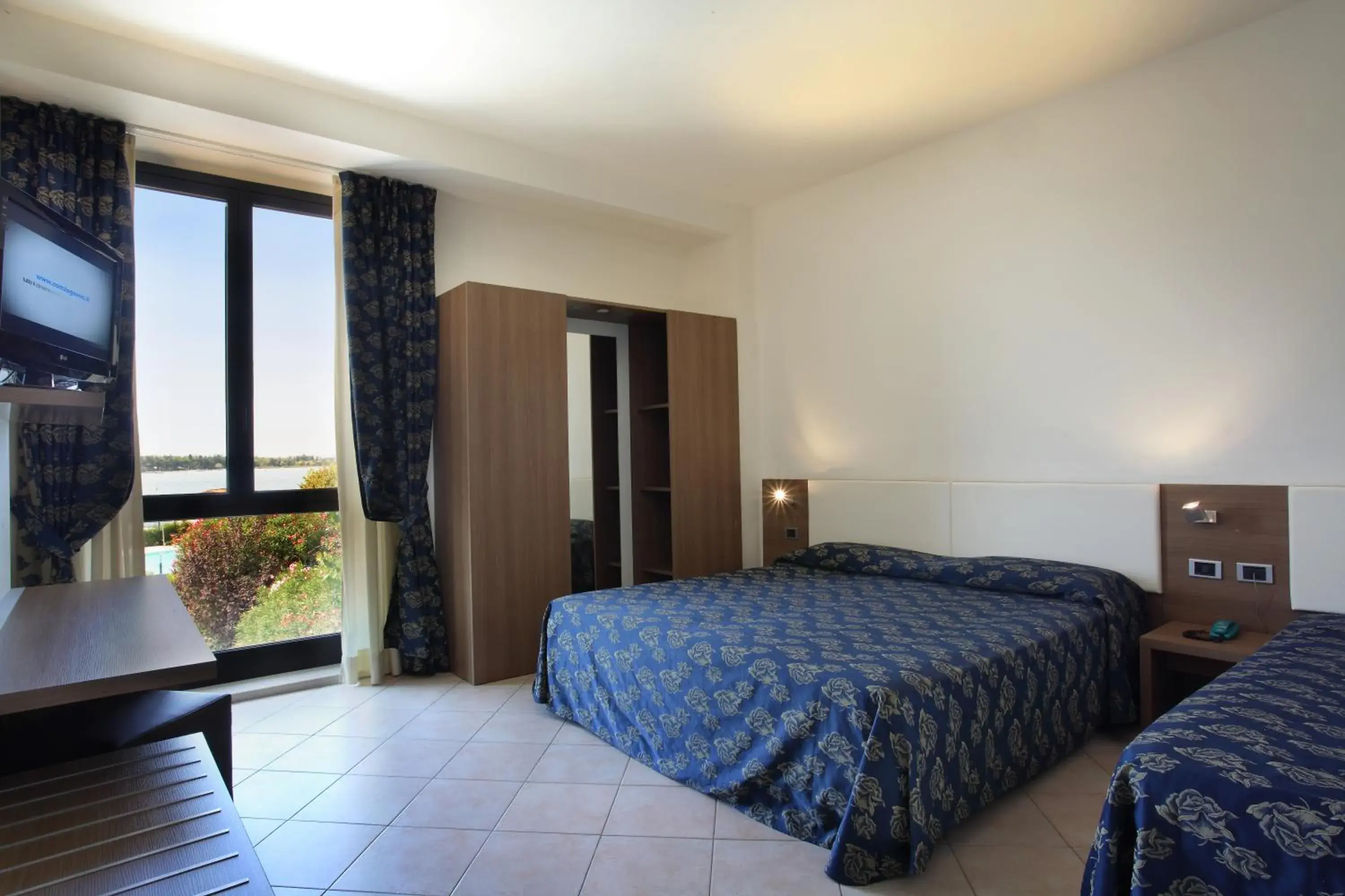 Triple Room in Hotel Ristorante Al Fiore Triple Room in Hotel Ristorante Al Fiore