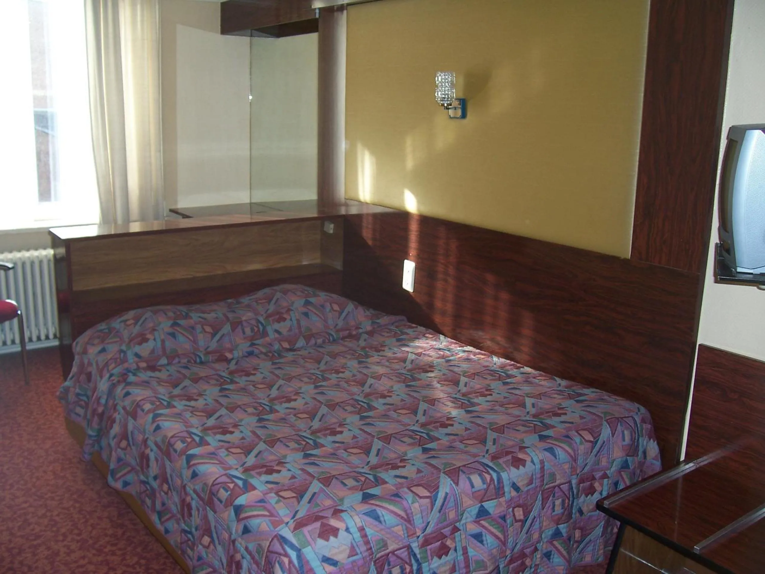 Bed in Hotel Manhattan