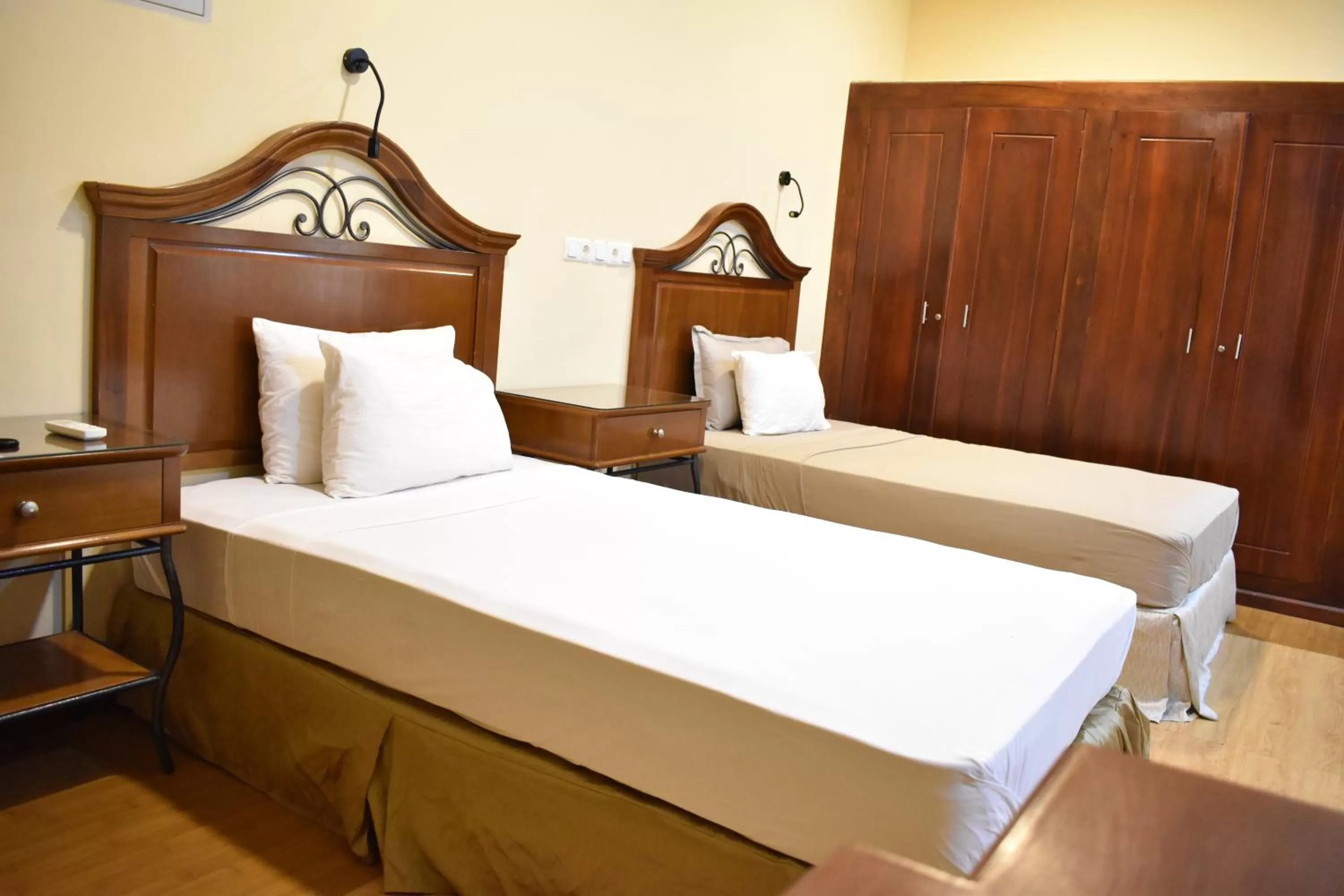 Bed in Hotel 4 U Saliya Garden
