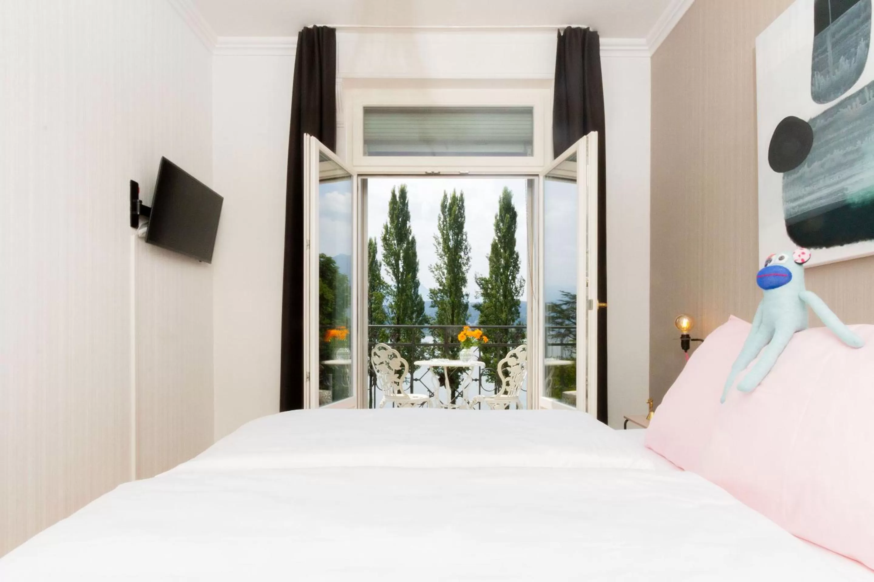 Photo of the whole room, Bed in Hotel Beau Séjour Lucerne