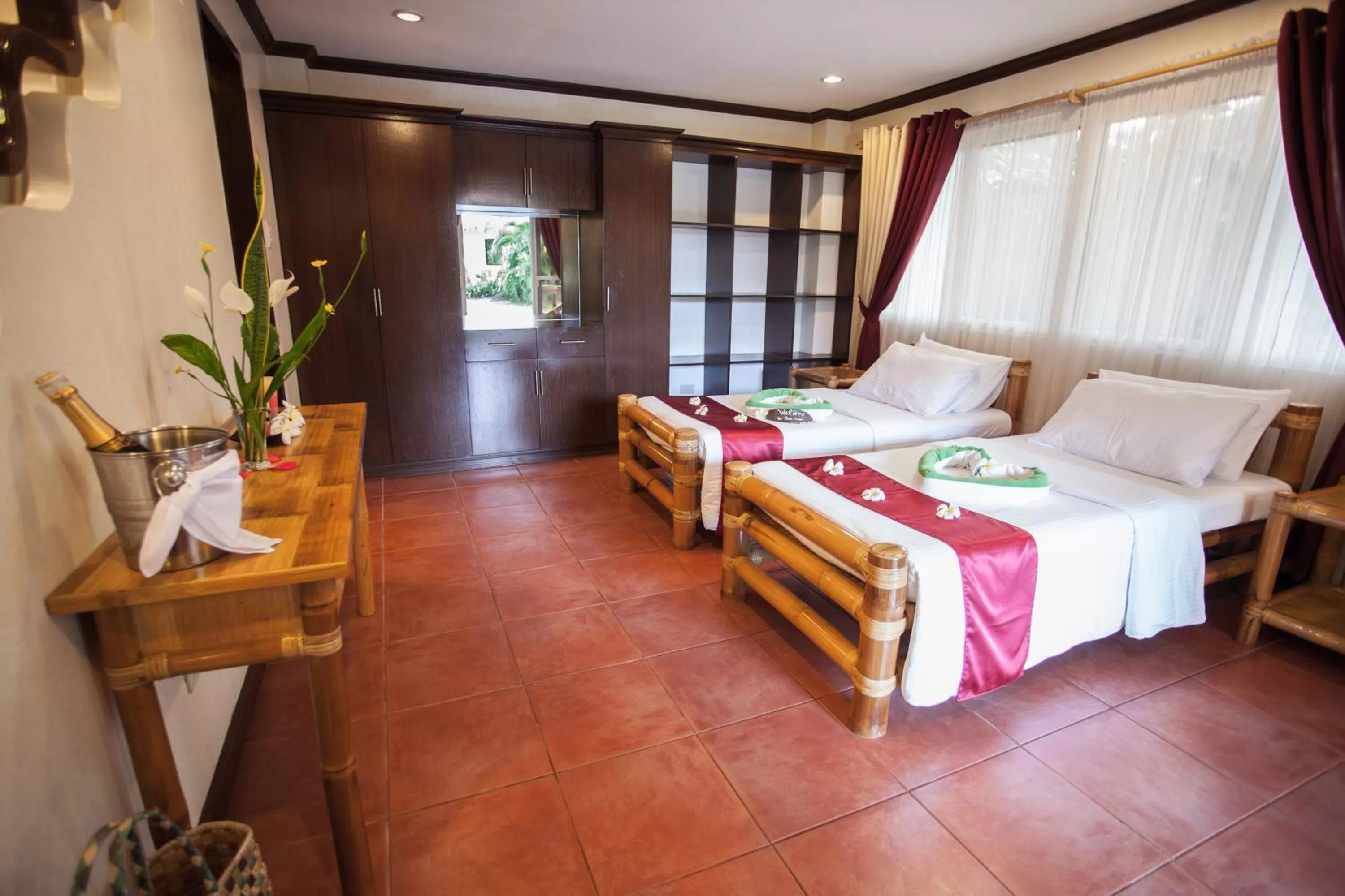 Bedroom, Bed in Pura Vida Beach & Dive Resort