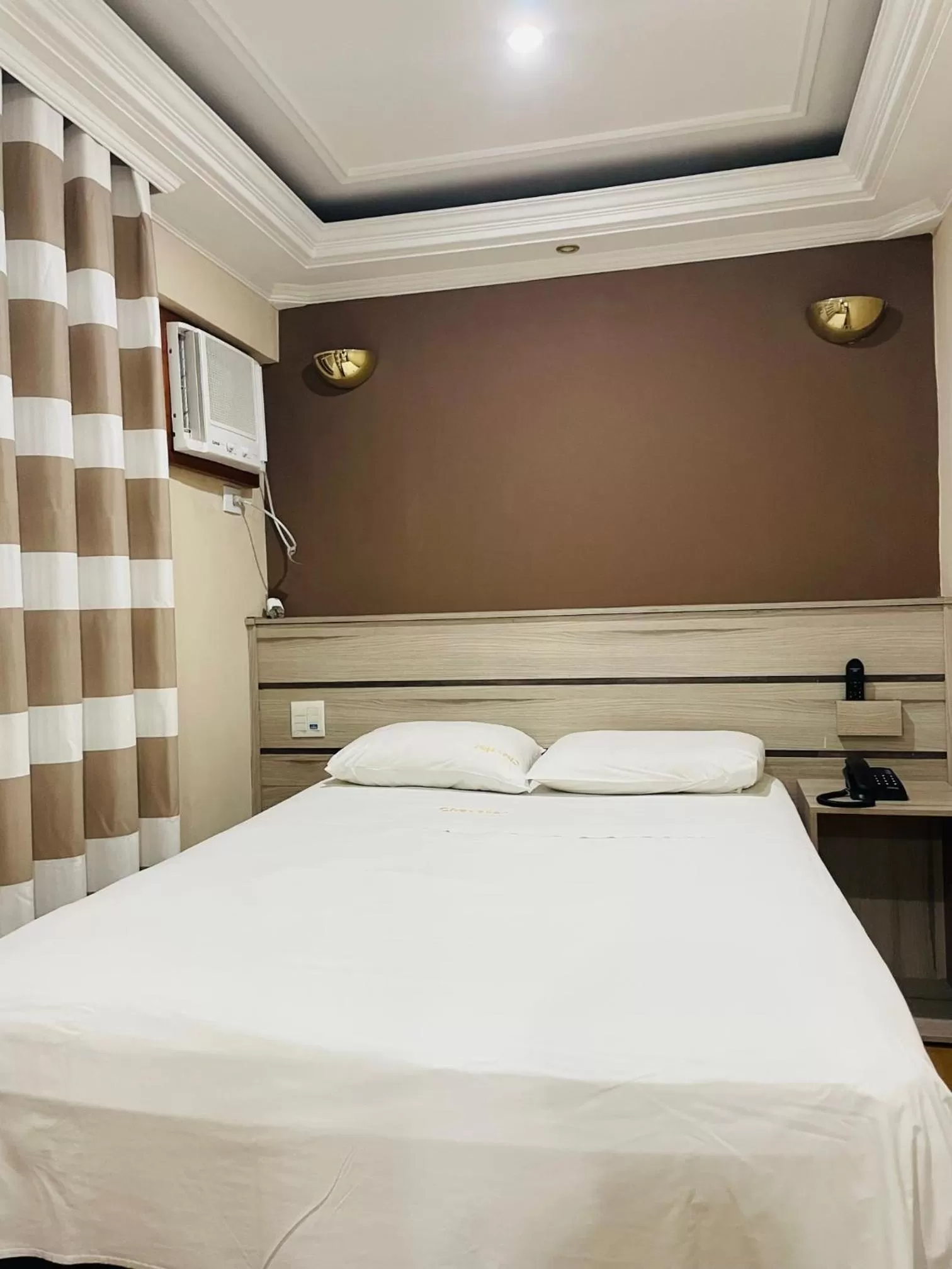 Bed in Gran Chevalier Hotel