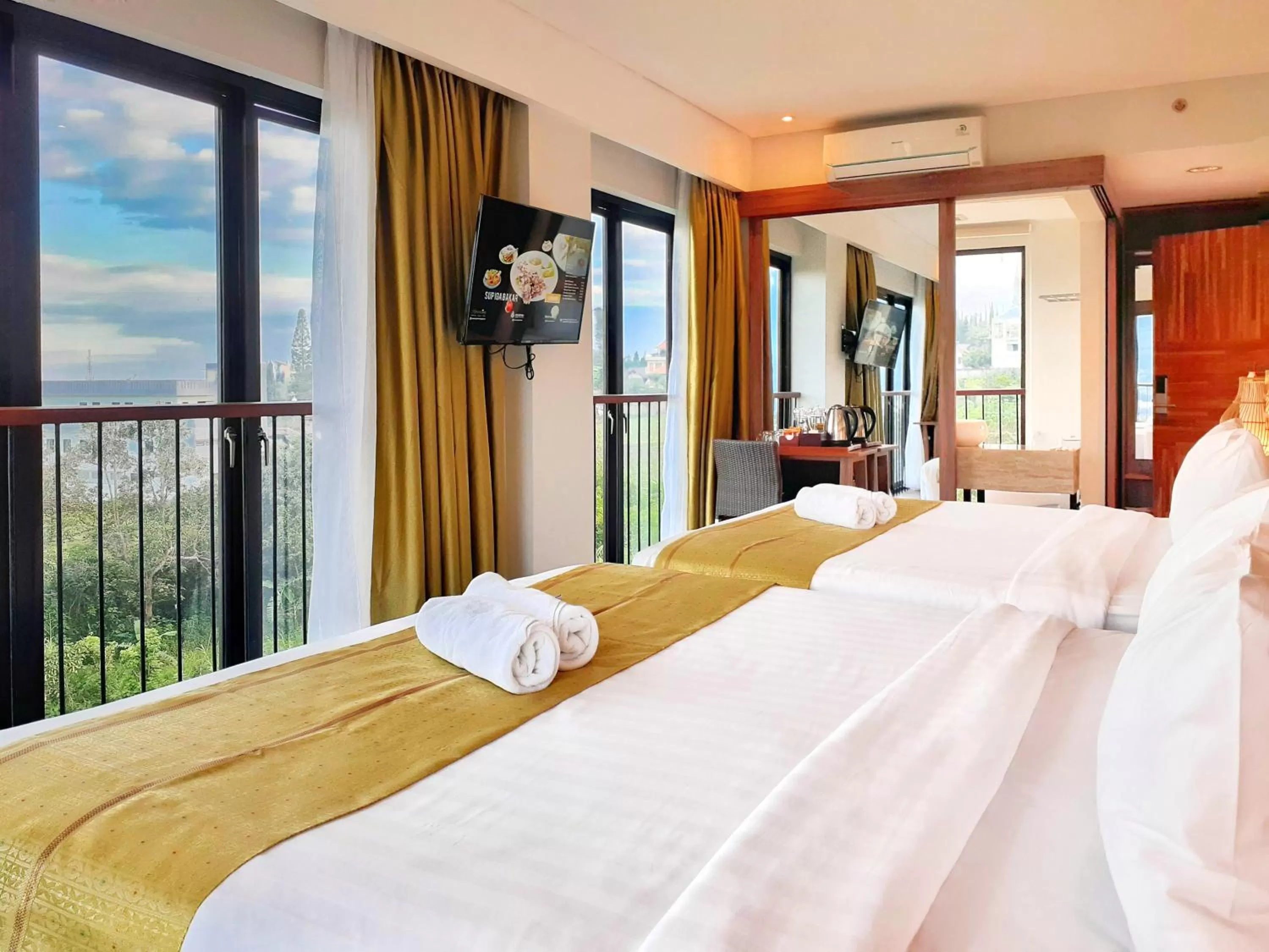 Bed in The Batu Hotel & Villas