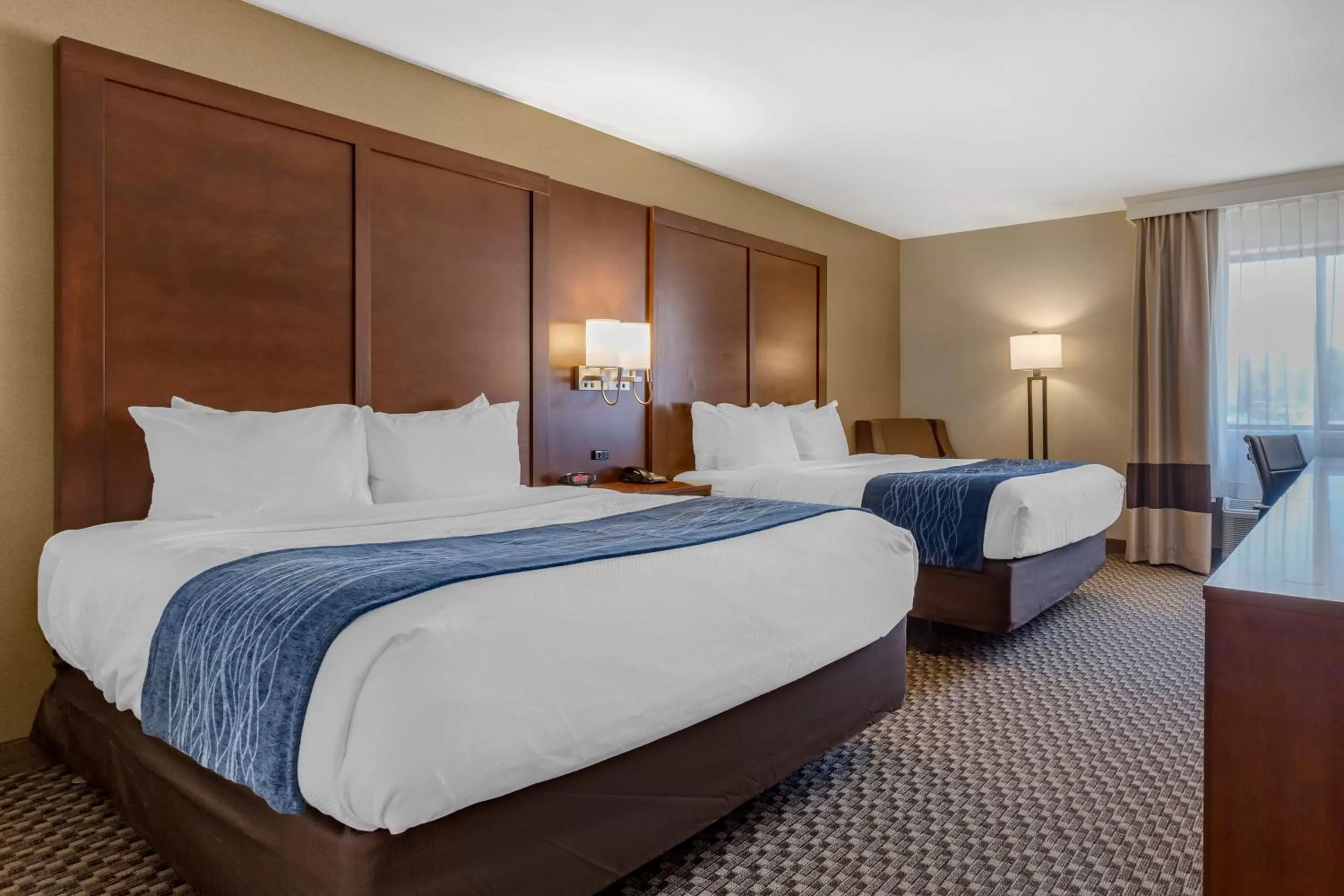 Bed in Comfort Inn at Buffalo Bill Village Resort