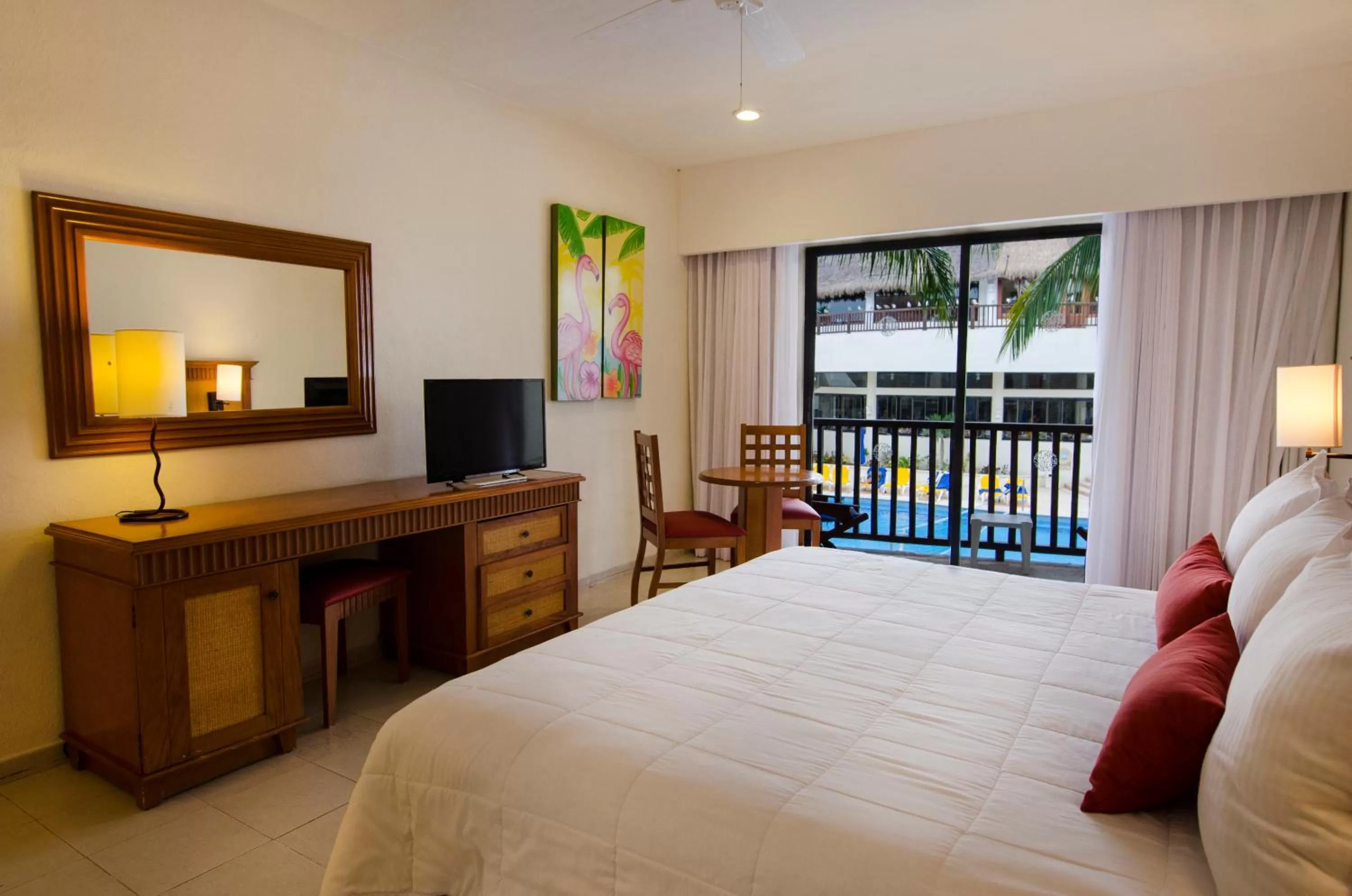 Bed in The Reef Coco Beach Resort & Spa- Optional All Inclusive