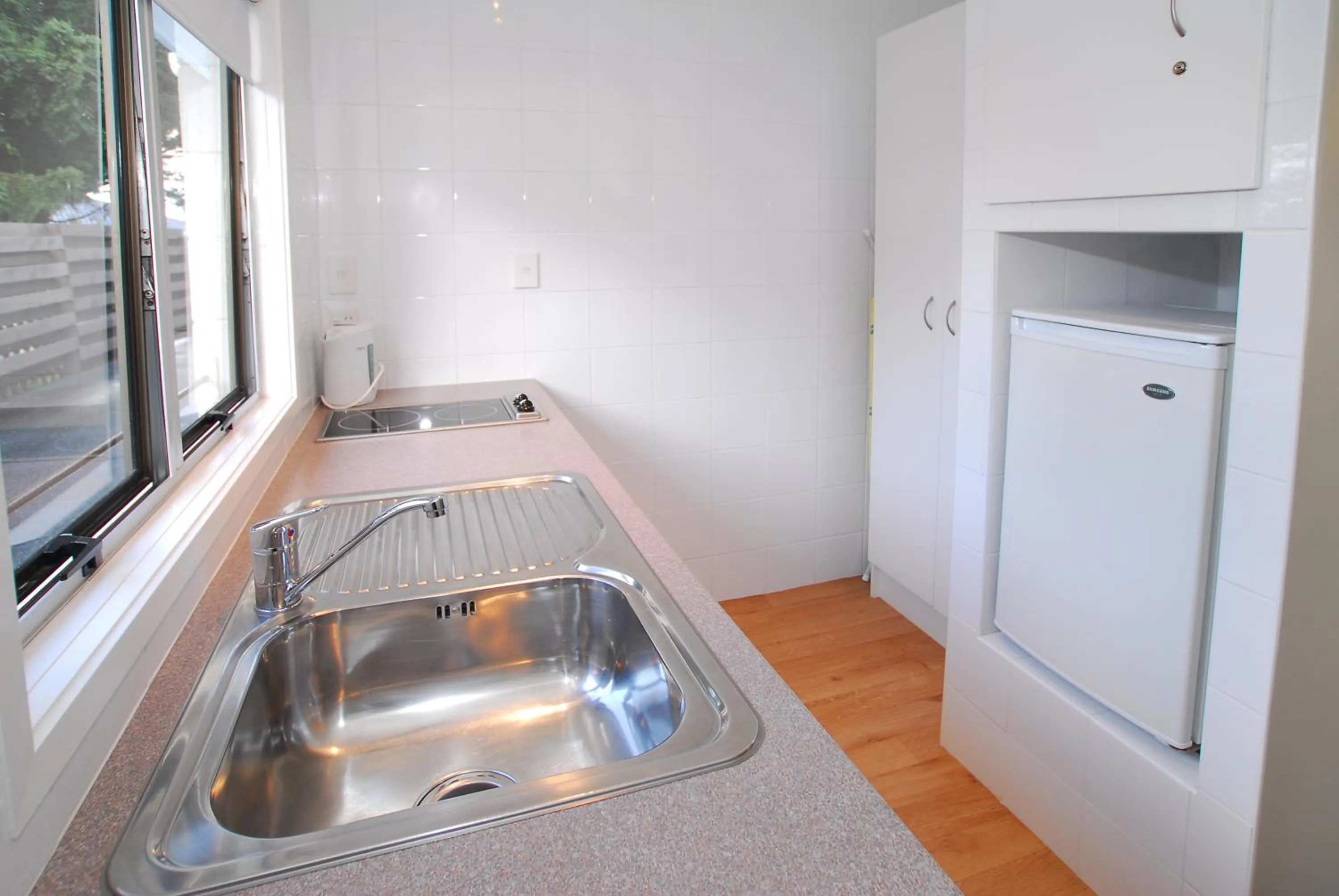 Kitchen or kitchenette in Takapuna Motor Lodge