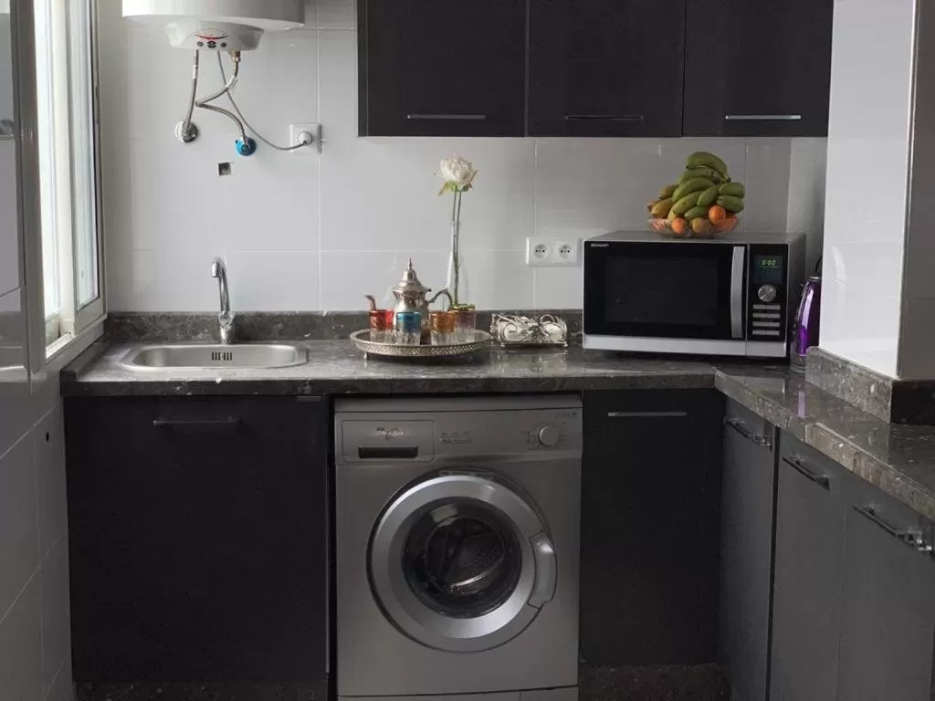 Kitchen/Kitchenette in Appart Hotel Monaco