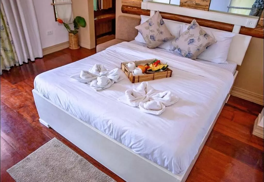 Bed in Peak View Resort