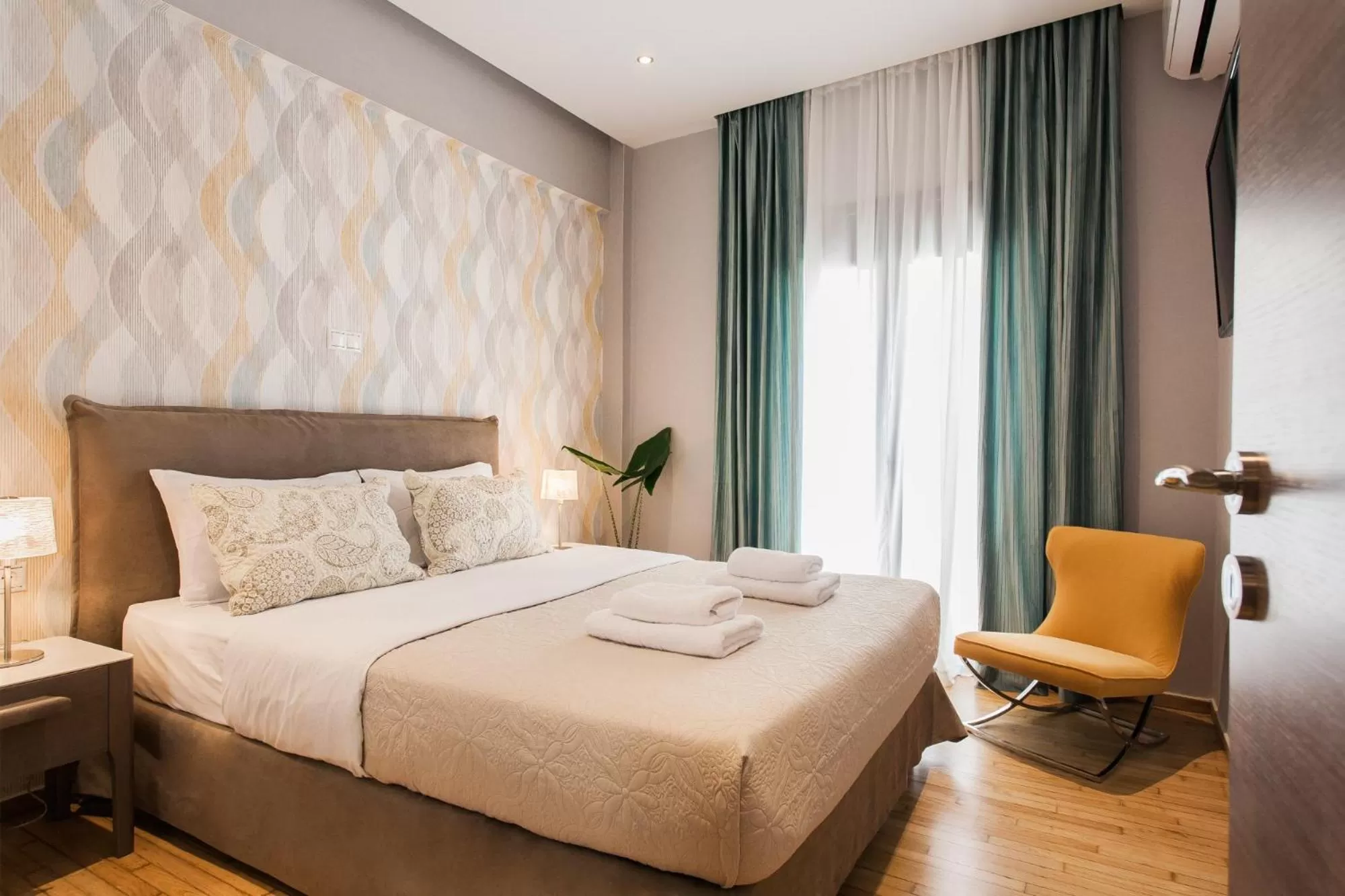 Bedroom, Bed in Nicholas Point Apartments and Rooms