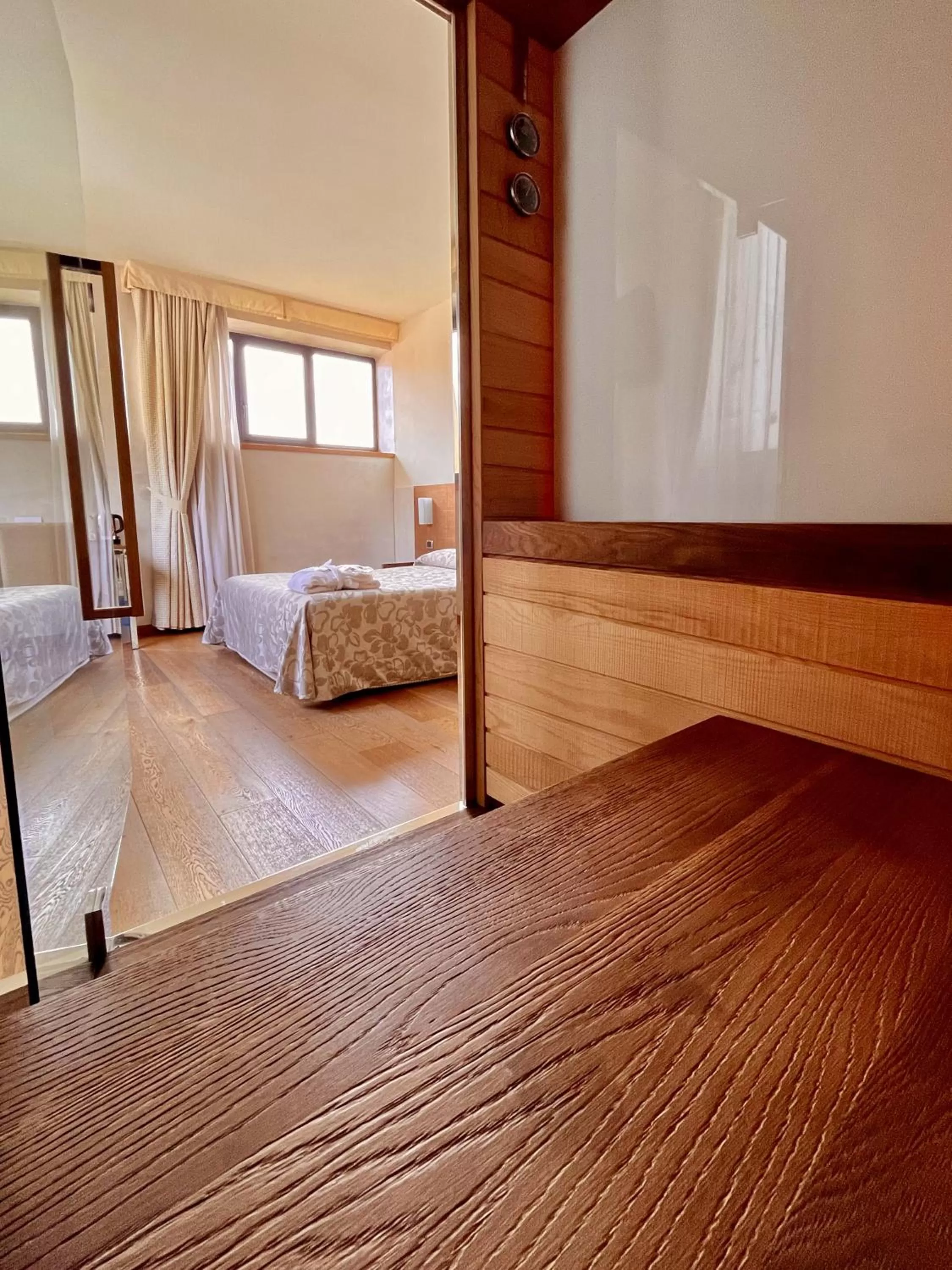 Bed in Hotel Lovere Resort & Spa