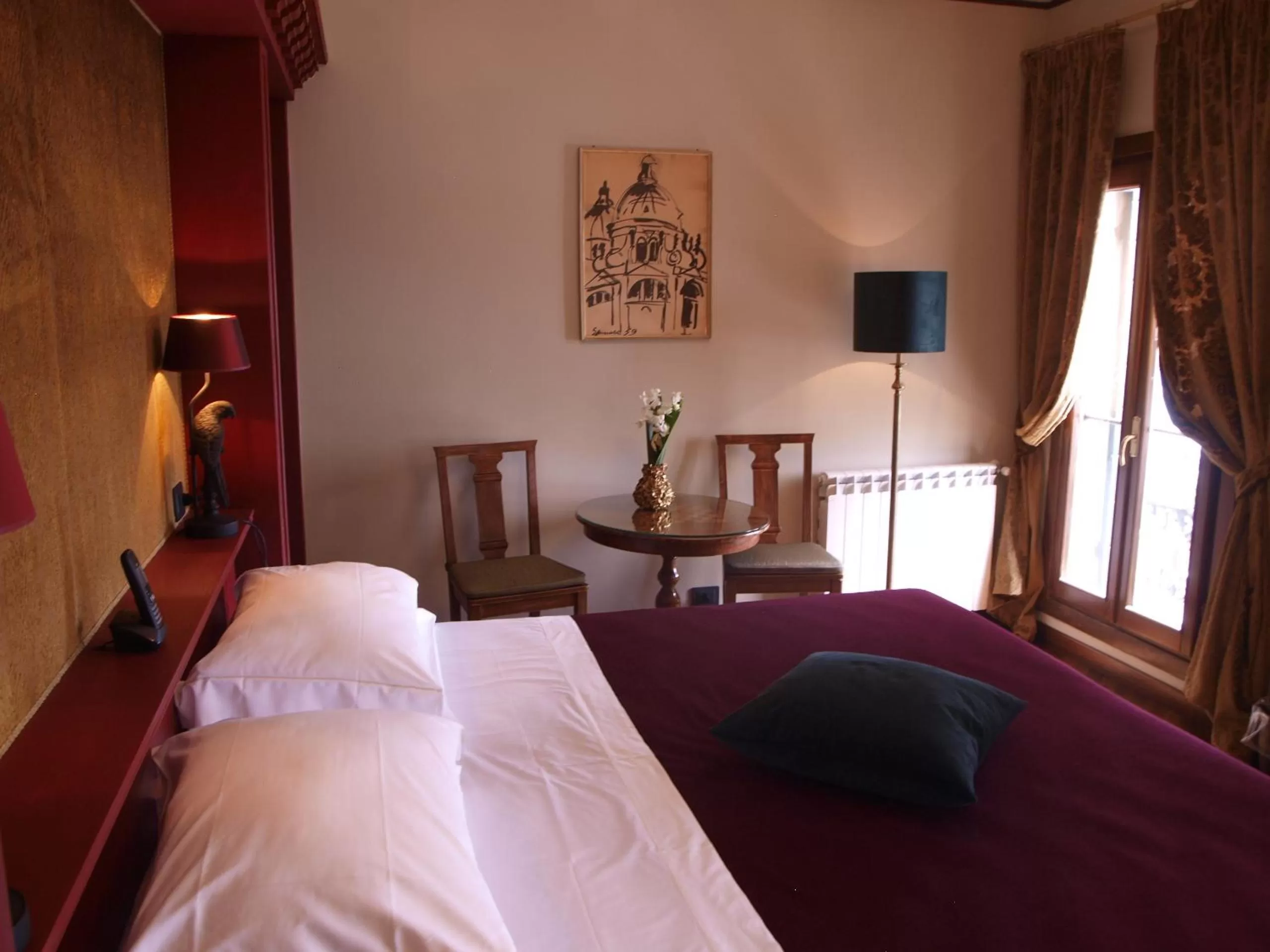 Bed in Hotel La Calcina