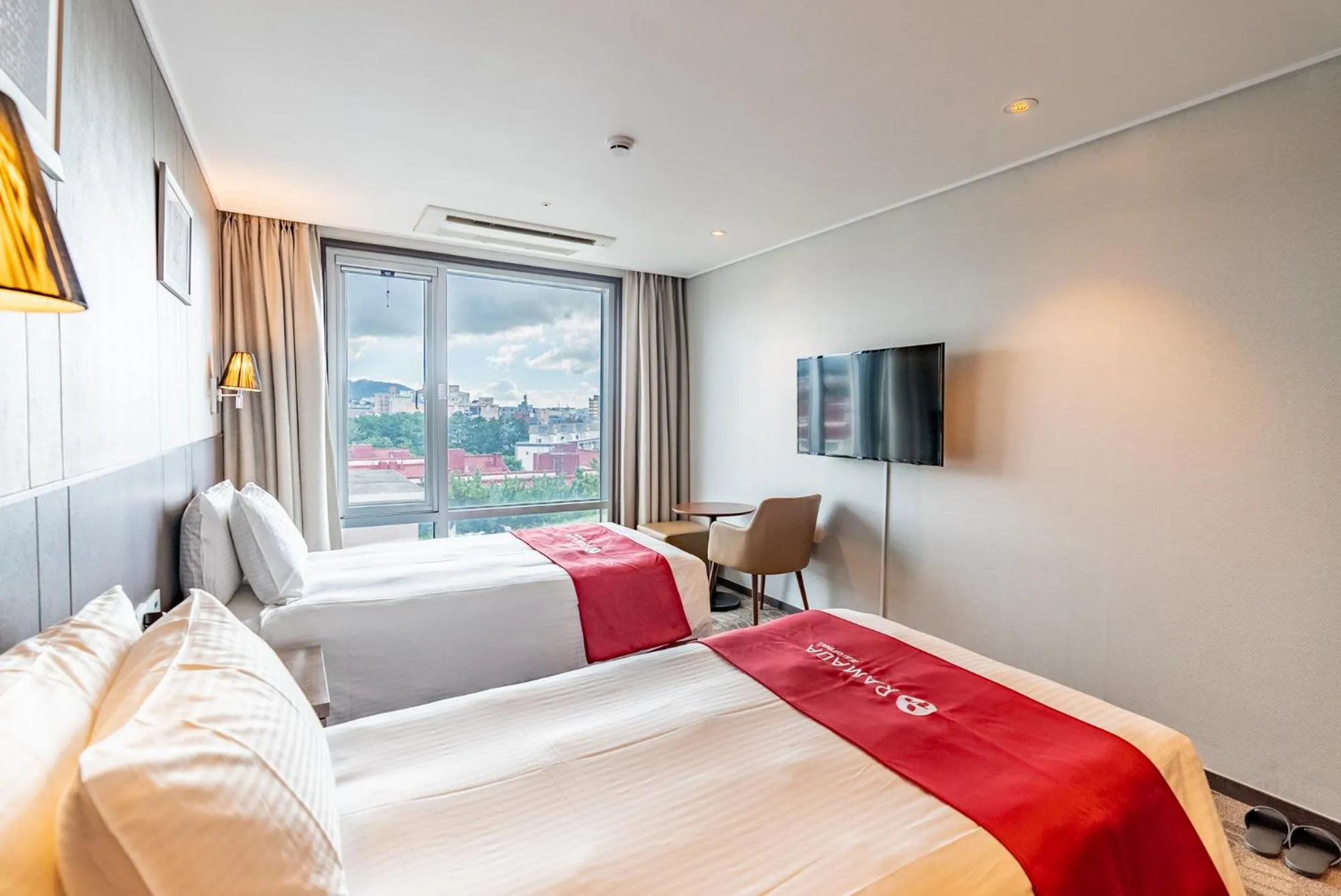 Bed in Ramada by Wyndham Jeju City Hall