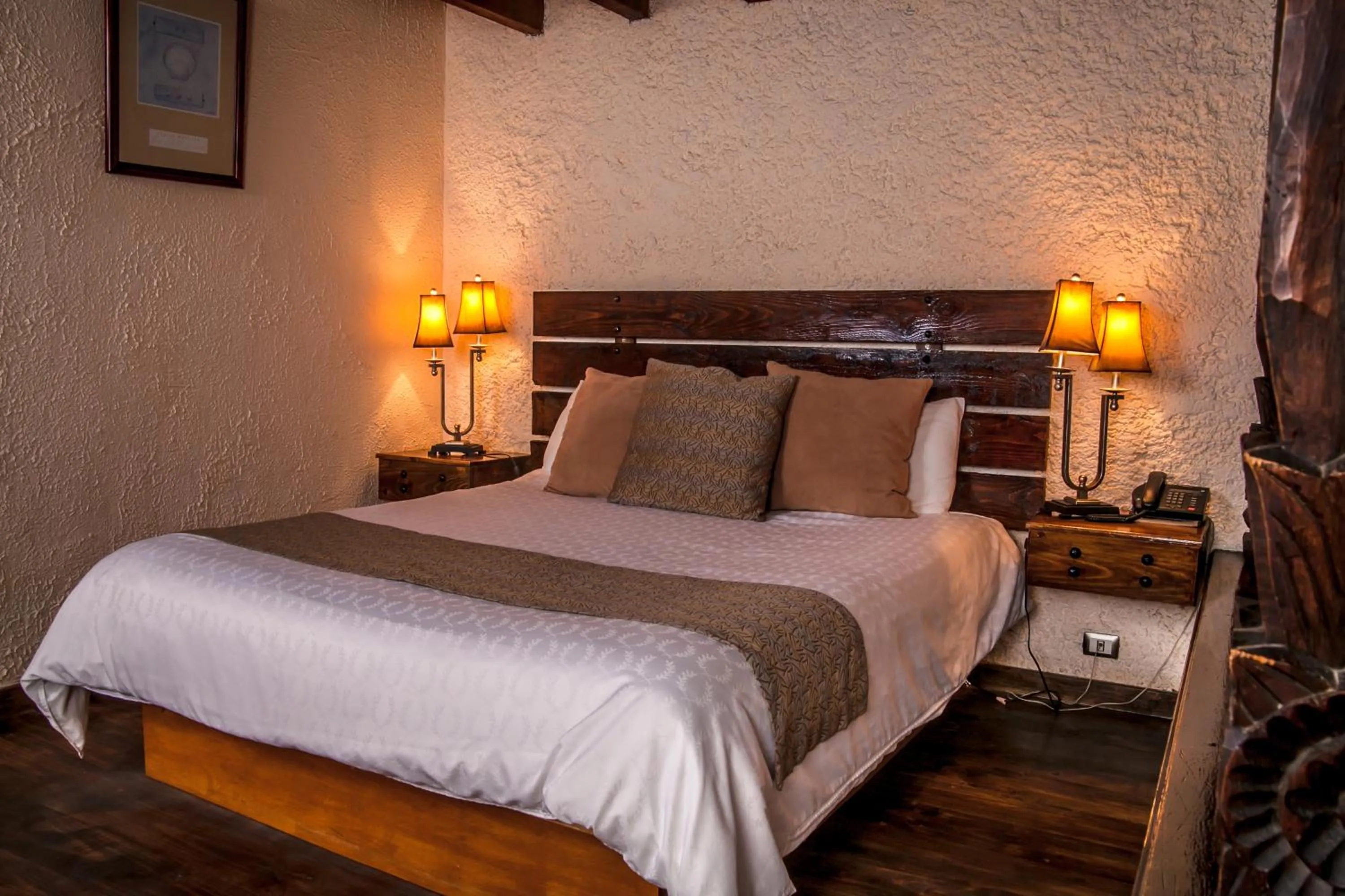 Bed in Las Rocas Resort & Spa