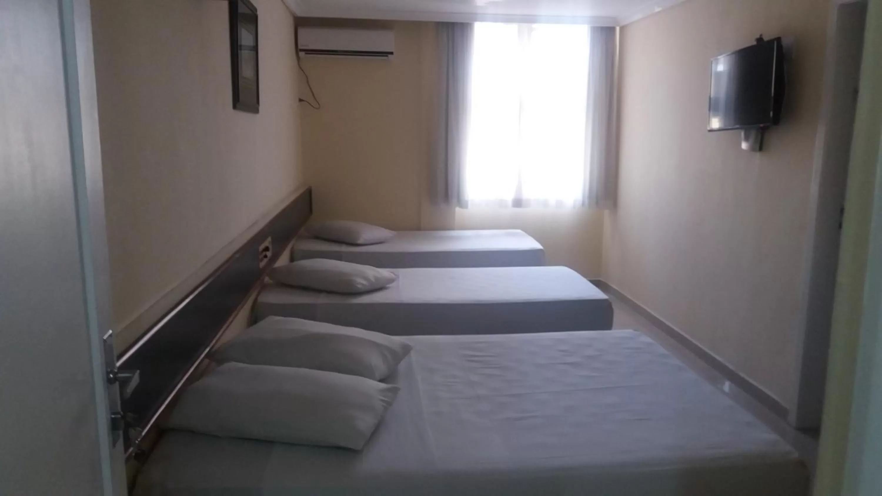 Bed in Hotel Estação Express