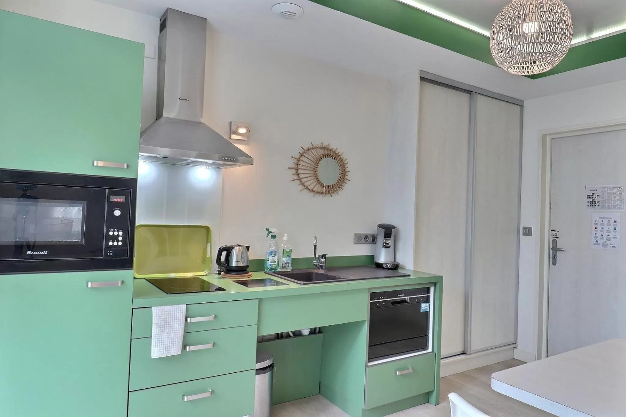 Kitchen or kitchenette in Garden Hotel Rennes Centre Gare