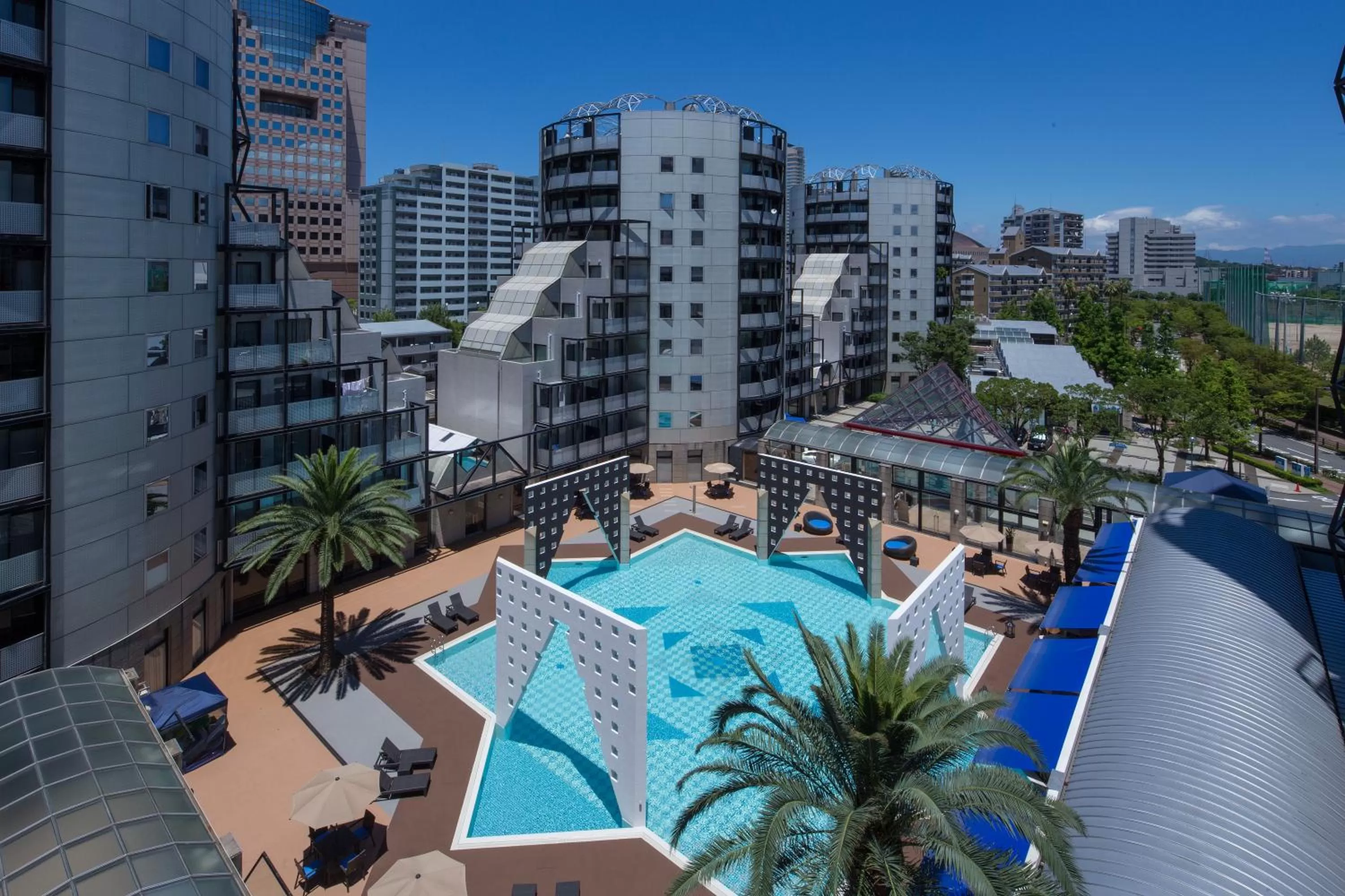 Swimming pool in The Residential Suites Fukuoka