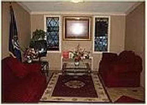 Living room in Kensington Inn - Howell