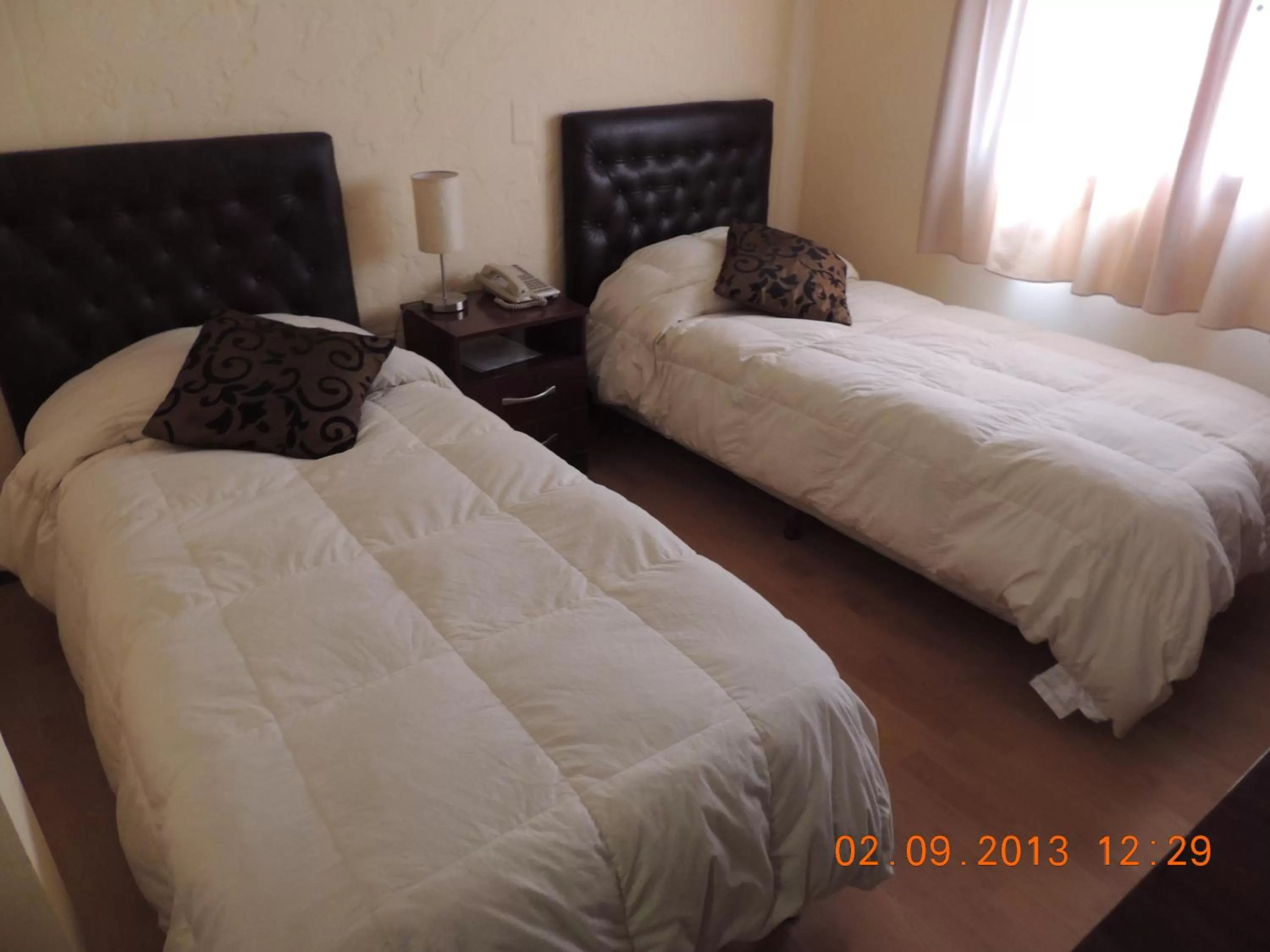 Bed in Hotel Internacional