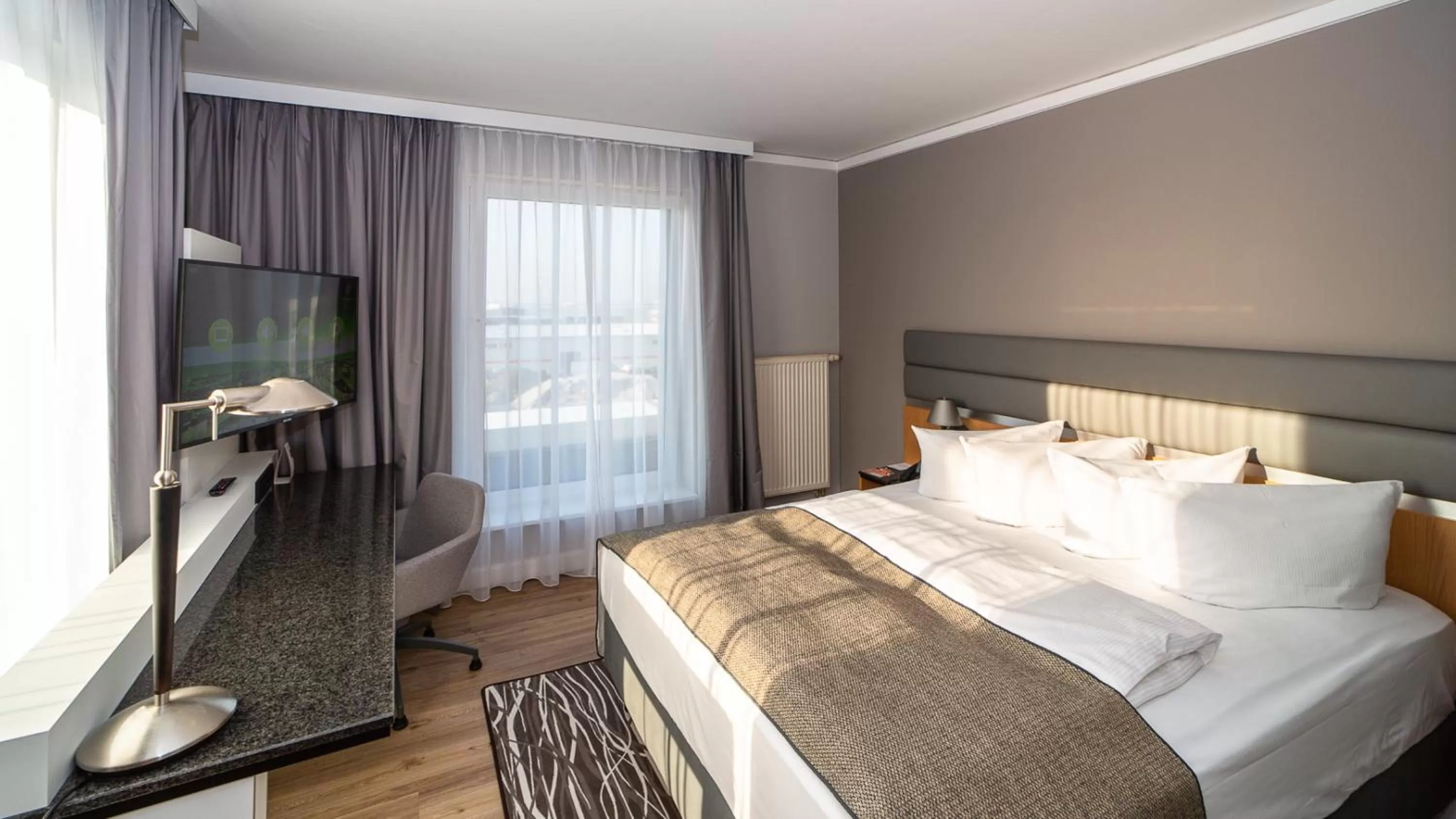 Photo of the whole room, Bed in Holiday Inn Berlin Airport - Conference Centre by IHG