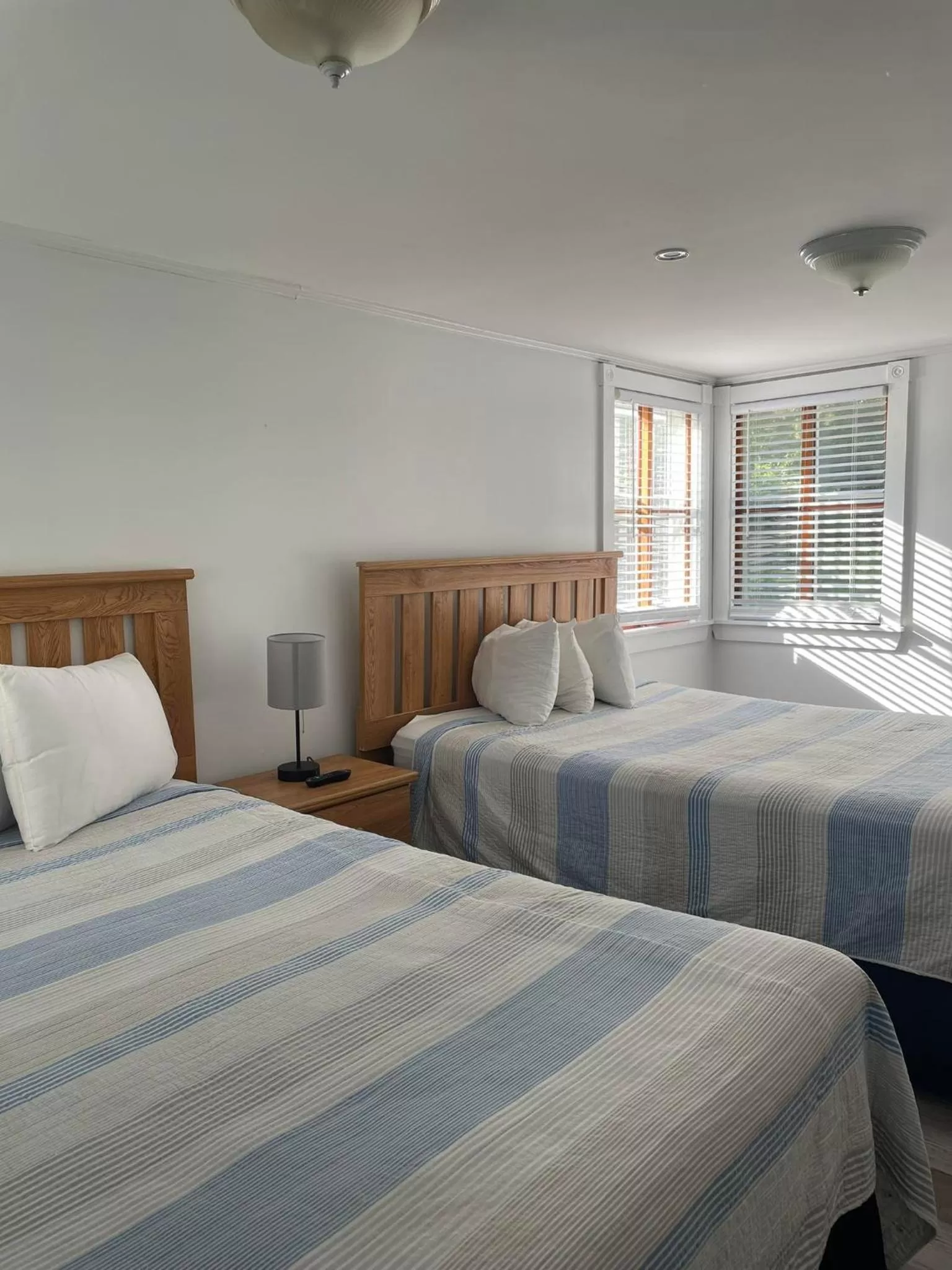 Bed in The Grand Beach Inn