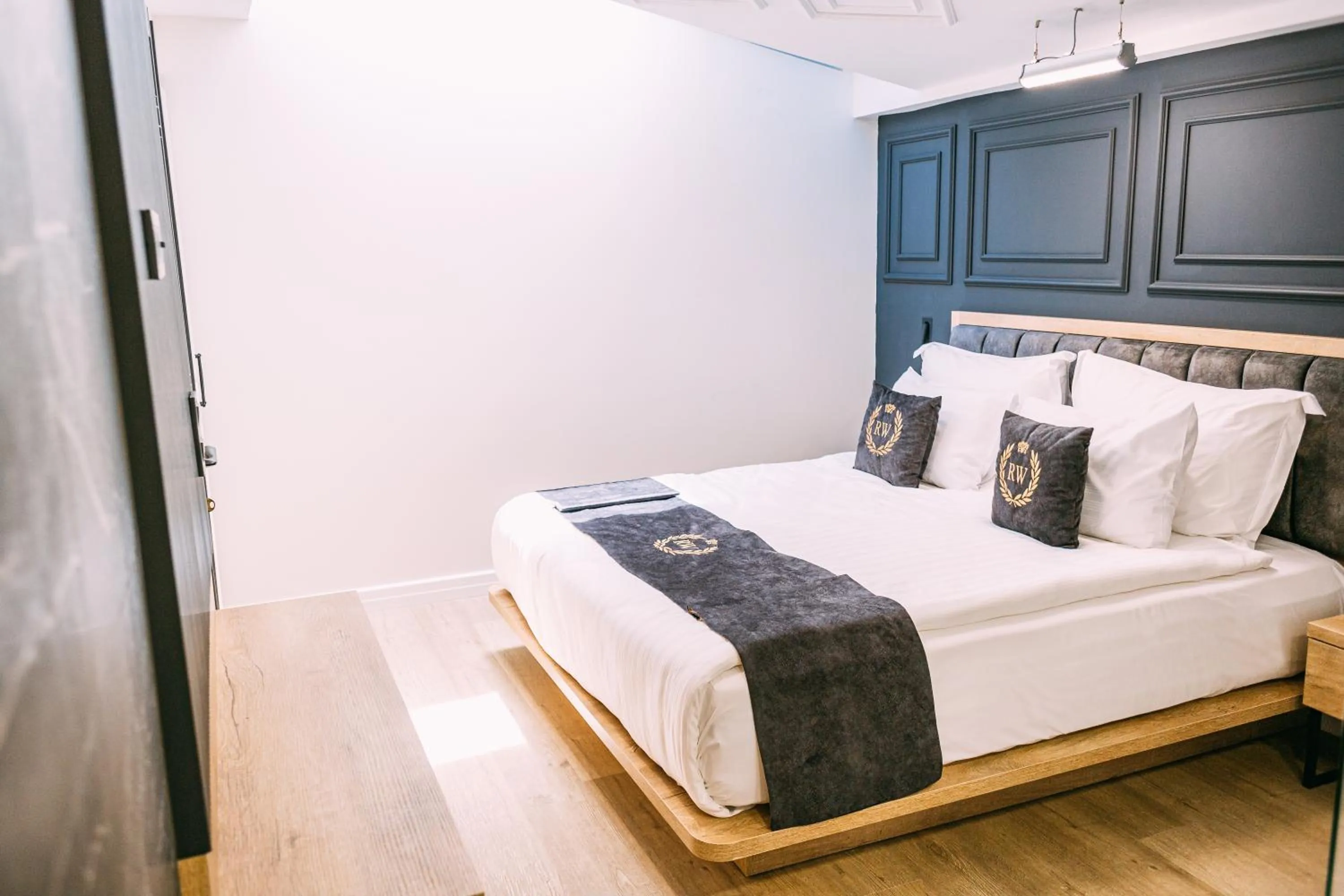 Bed in RW BOUTIQUE HOTEL