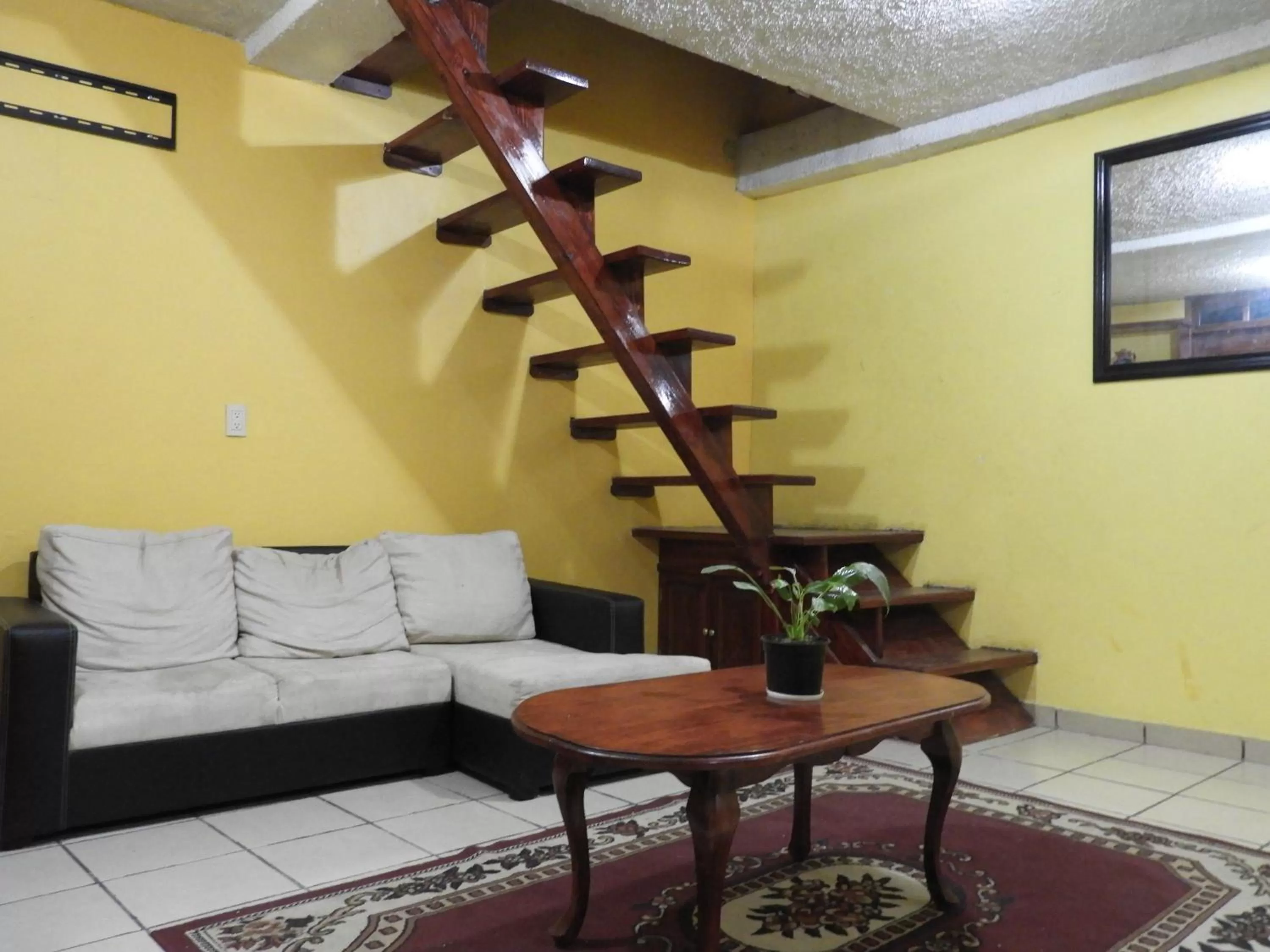 Communal lounge/ TV room in La Lotería Panoramic House & Rooftop by Lunian