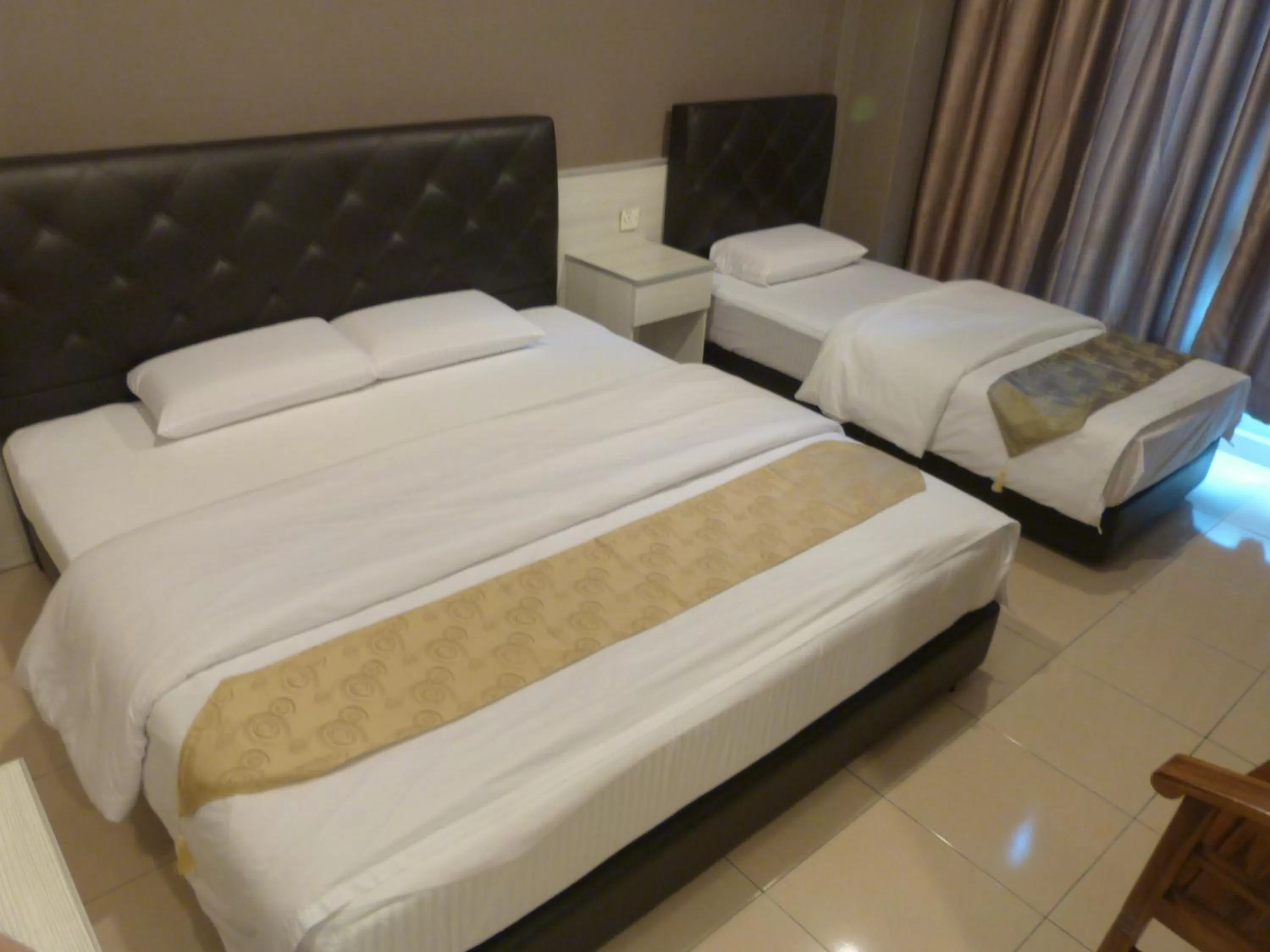 Bed in AERO Star Hotel