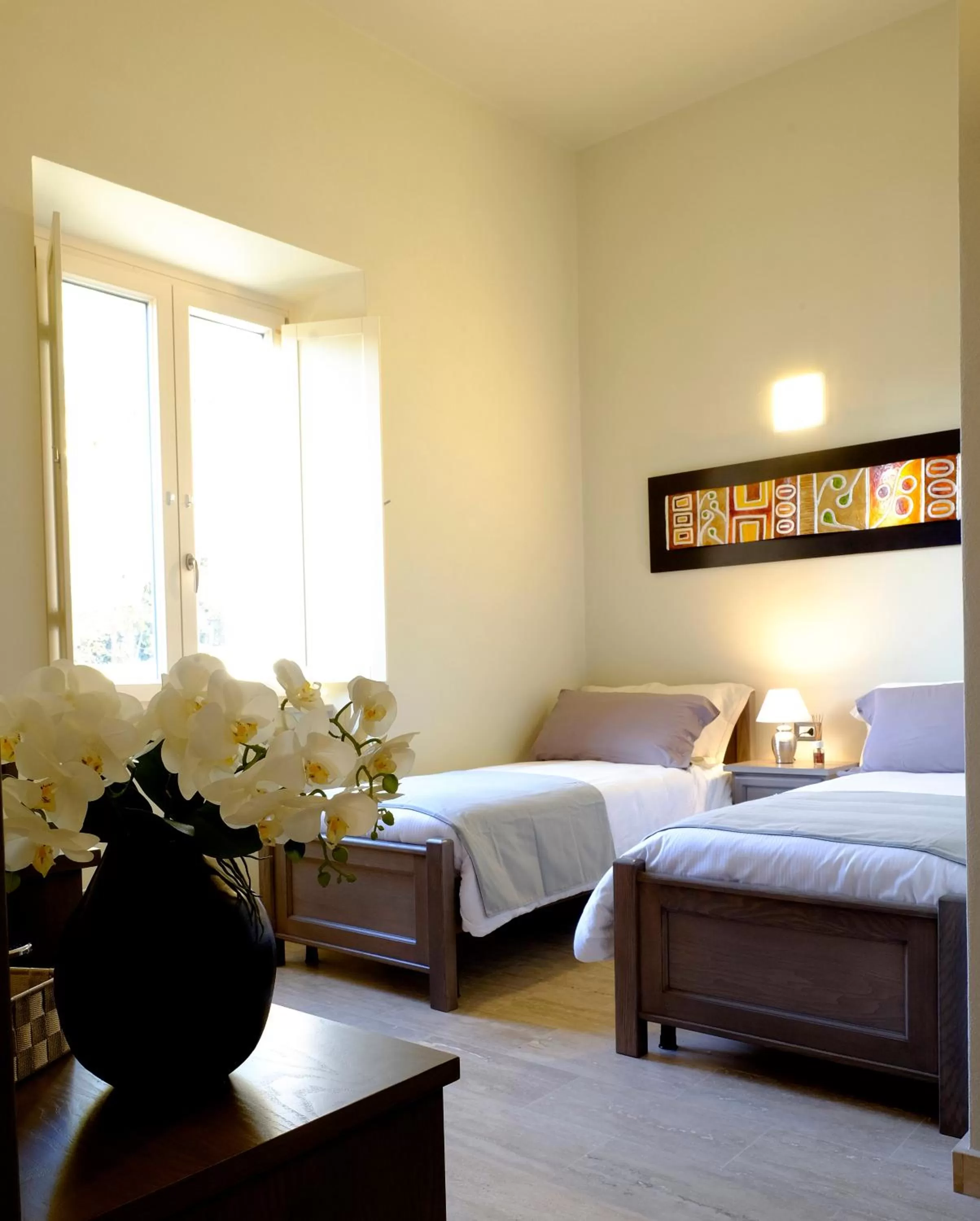 Photo of the whole room, Bed in EOS Room and Breakfast