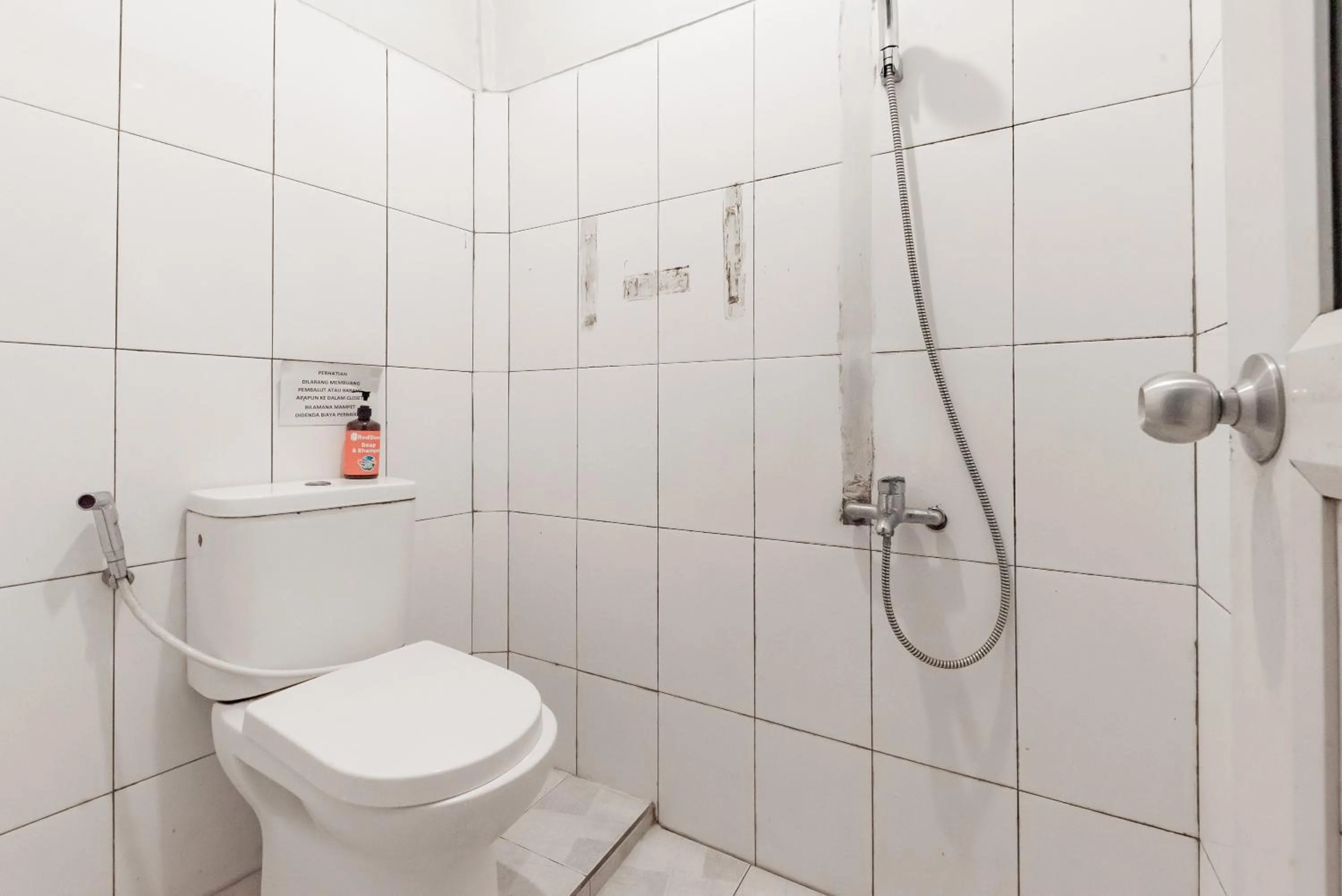 Bathroom in RedDoorz near Botani Square Mall