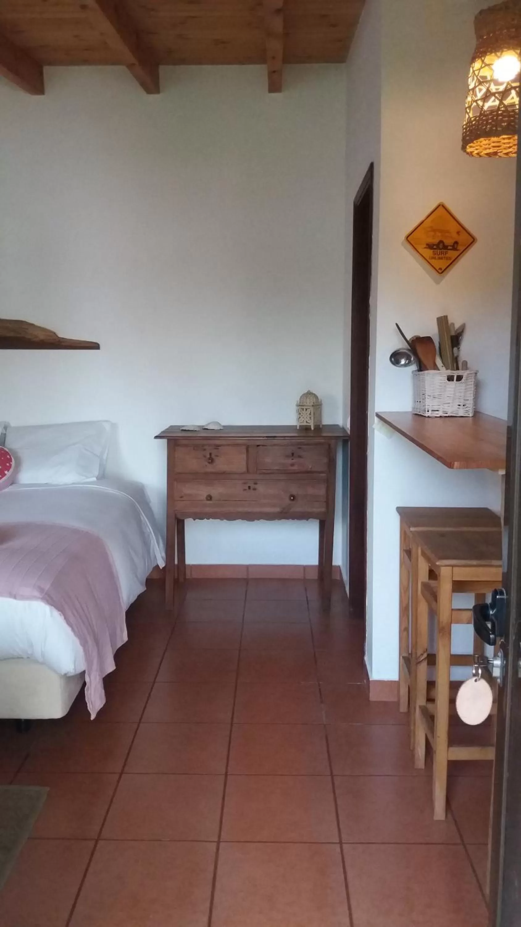 Bed in PuraVida Divehouse