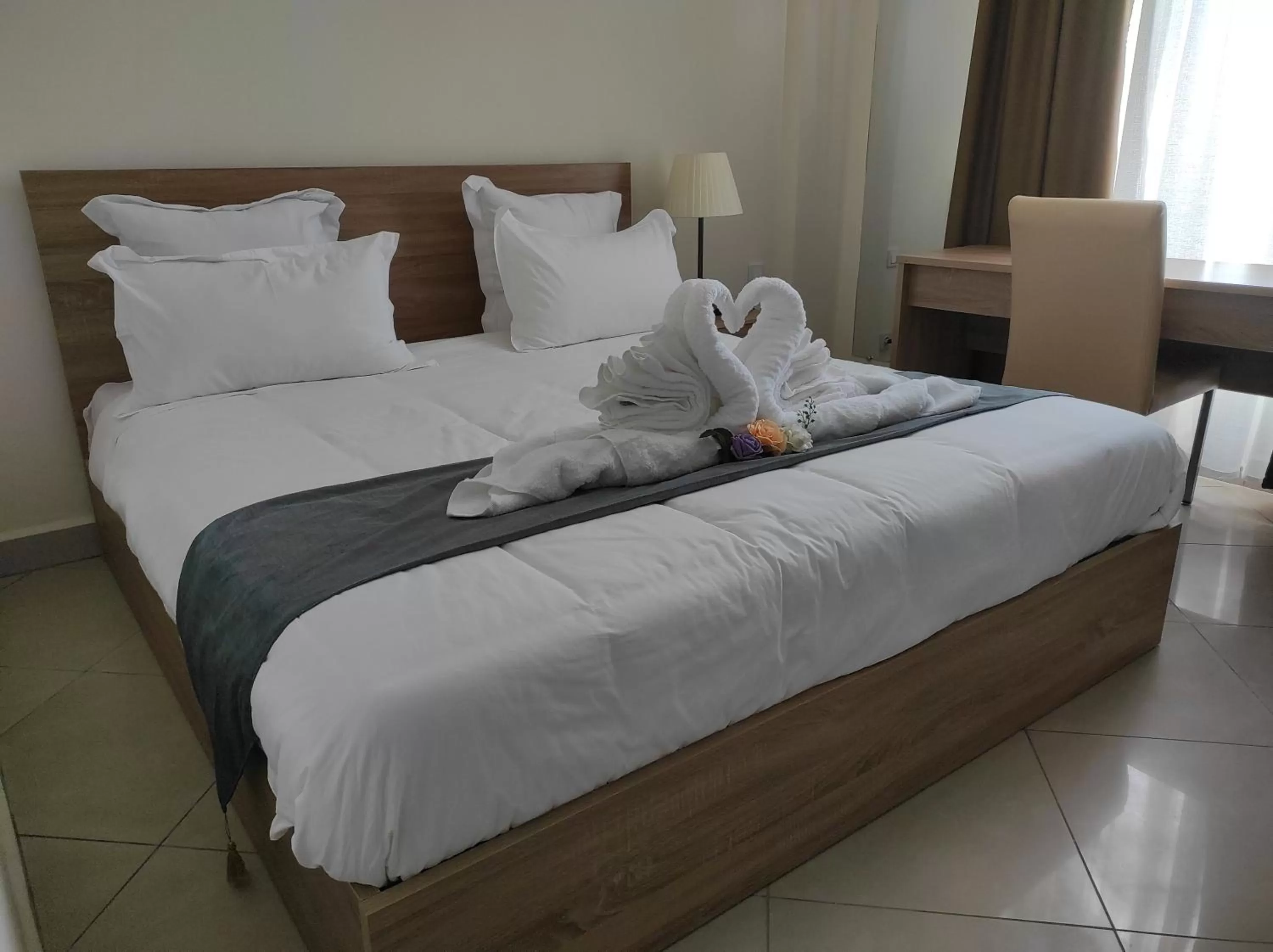 Bed in Downtown Hotel