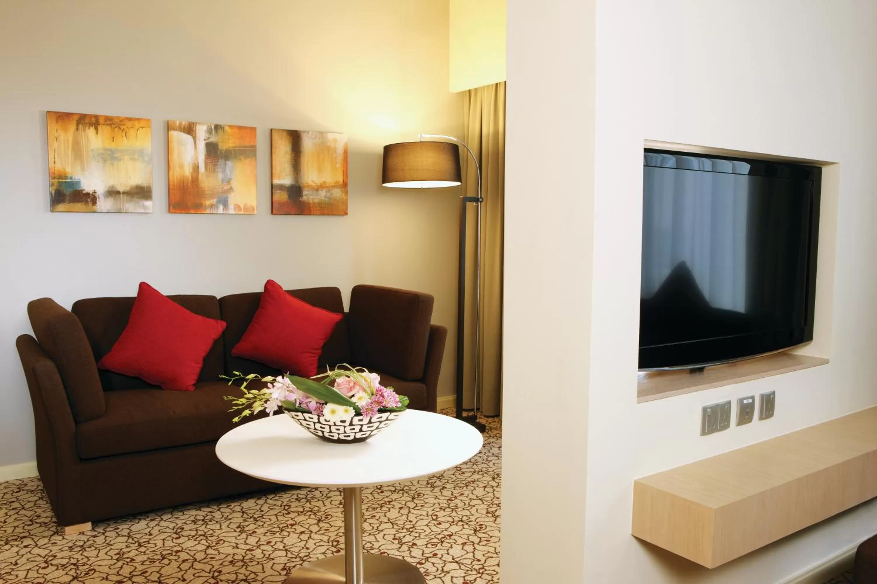 TV and multimedia in Novotel Suites Mall Avenue Dubai