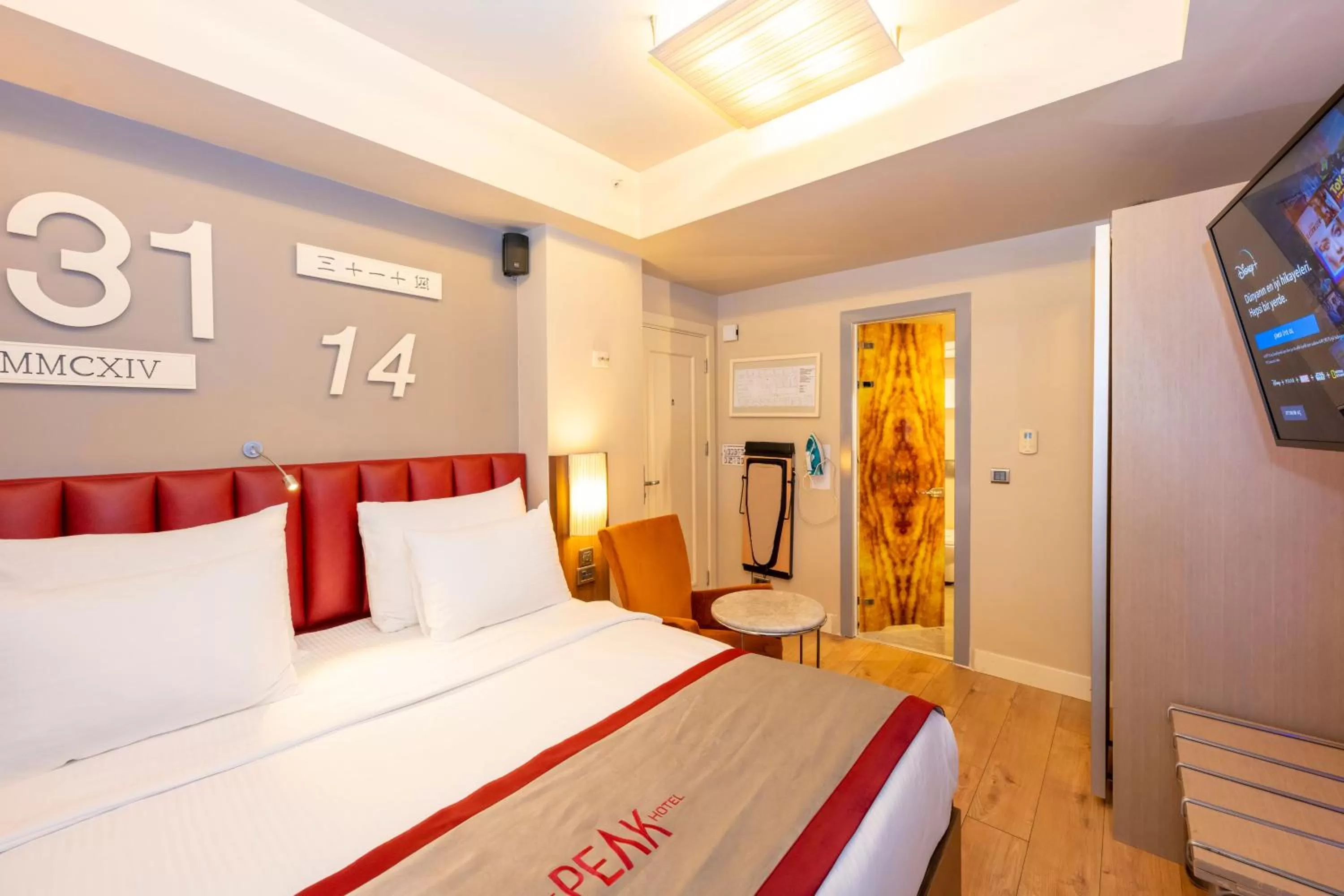 Communal lounge/ TV room, Bed in Ramada By Wyndham Istanbul Pera Taksim