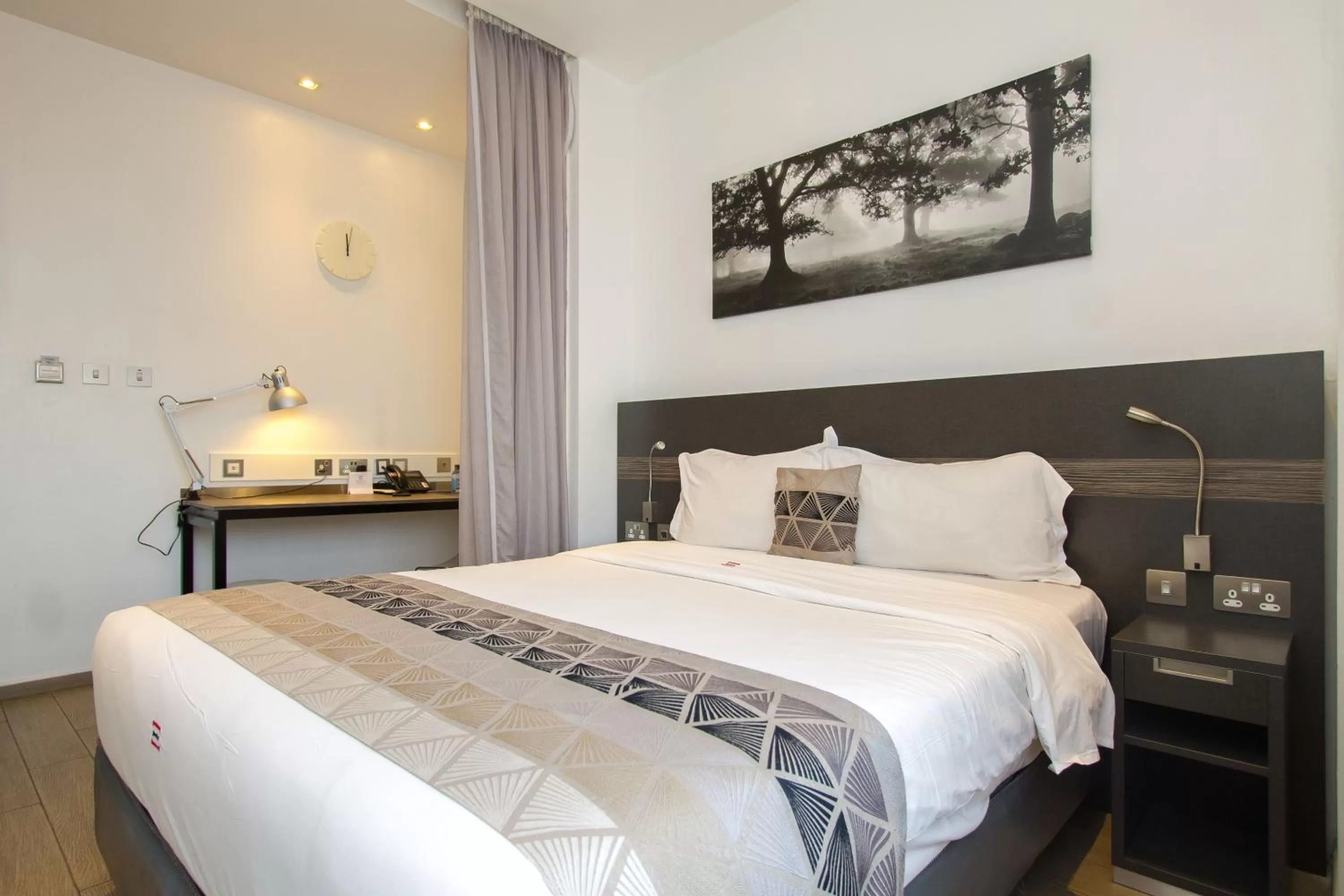 Bed in Imperial Hotel Express