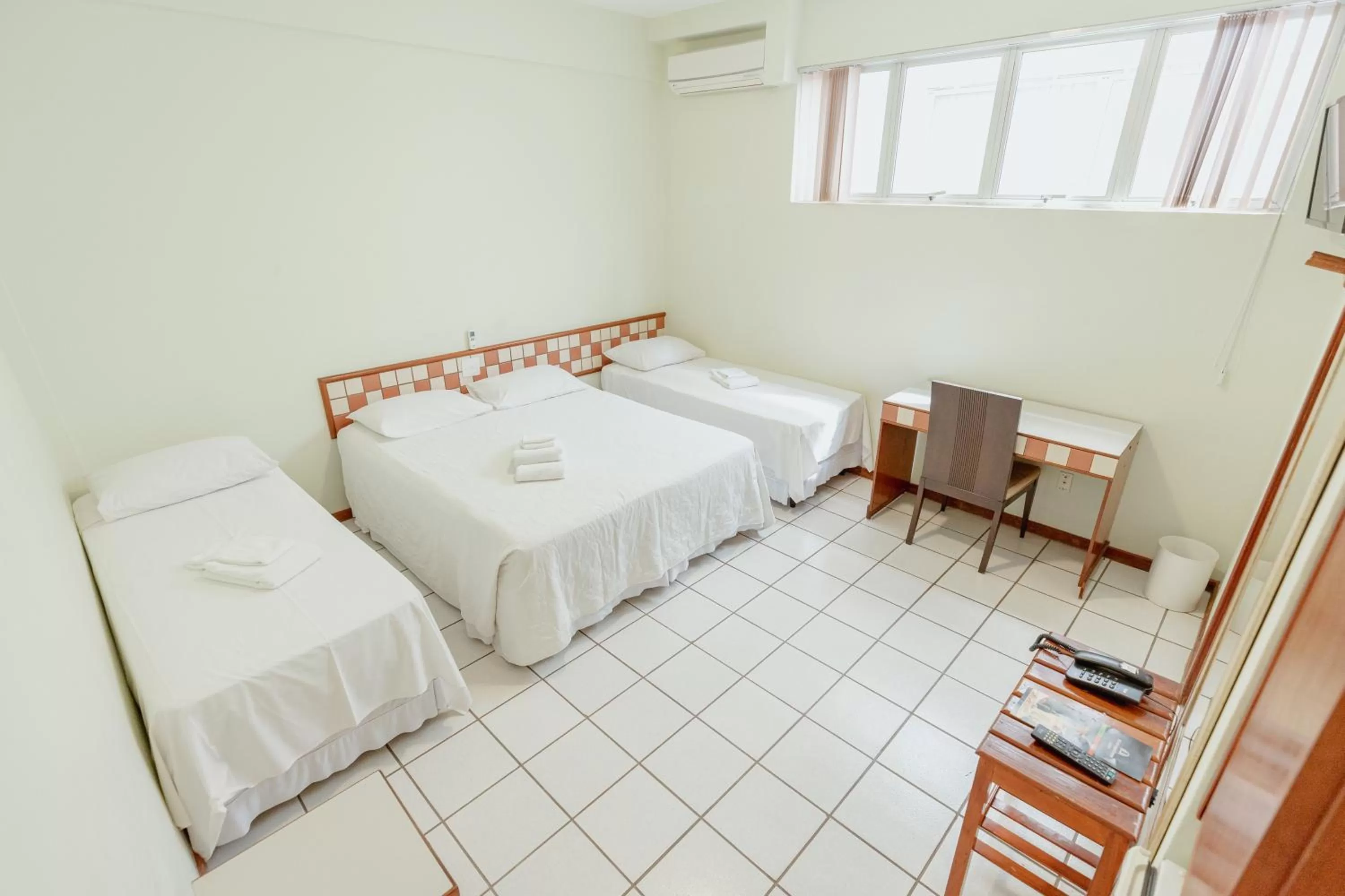 Bed in Hotel Metropolitano