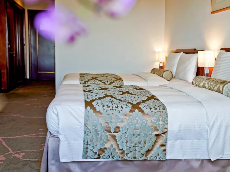 Bed in The Howard Prince Hotel Taichung