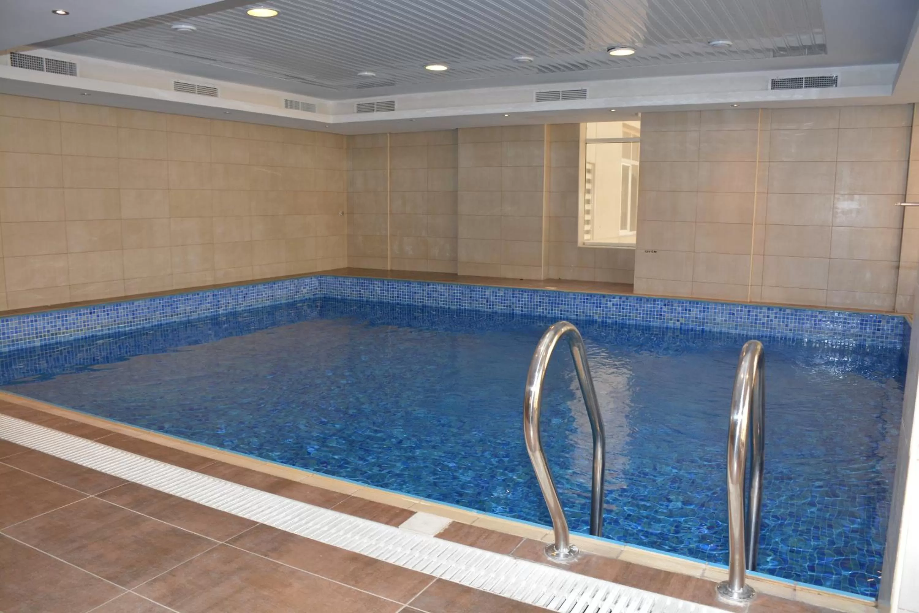 Swimming pool in Continental Inn Hotel Al Farwaniya