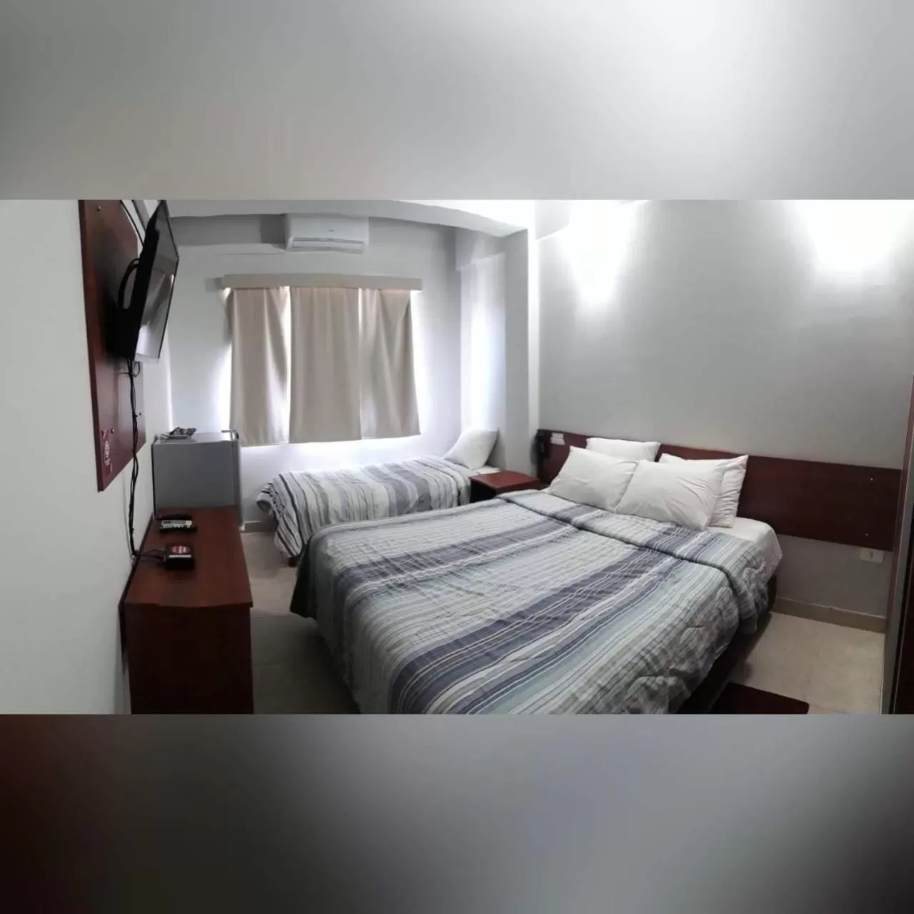 Bed in Madame Lynch Hotel Boutique