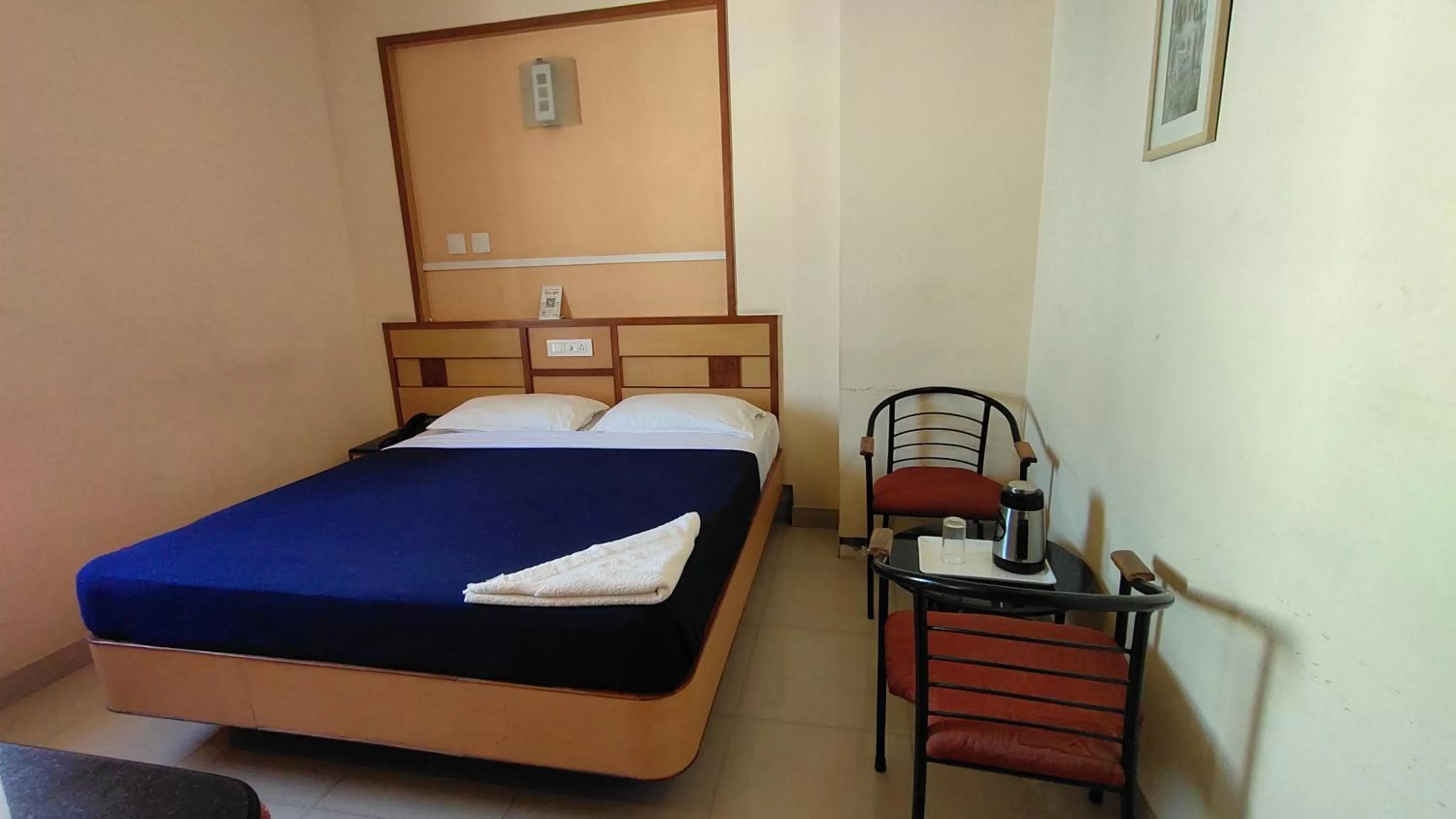 Bed in Hotel Aishwarywaa