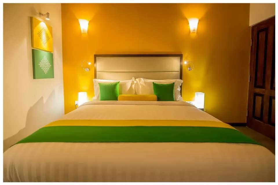 Bed in The Thinnai - All-Suites Boutique Hotel